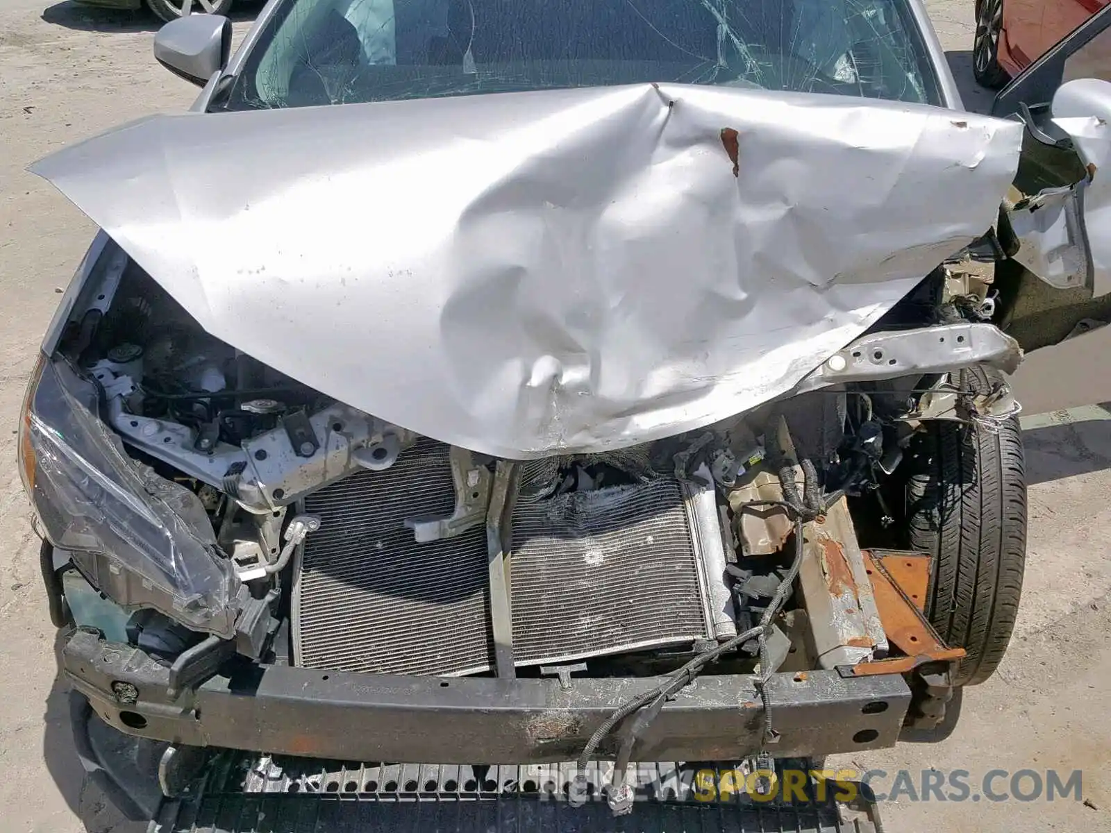 7 Photograph of a damaged car 5YFBURHE9KP874941 TOYOTA COROLLA 2019