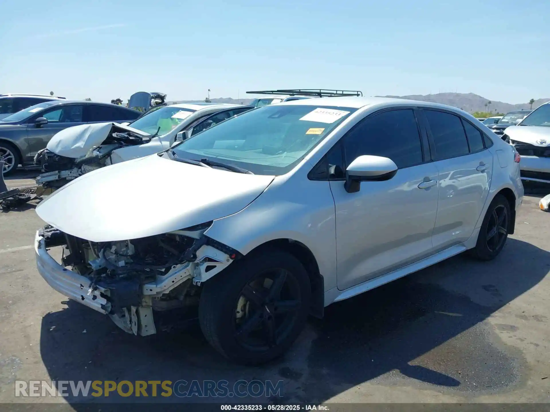 2 fotografías del automóvil dañado 5YFEPRAEXLP028690 TOYOTA COROLLA 2020