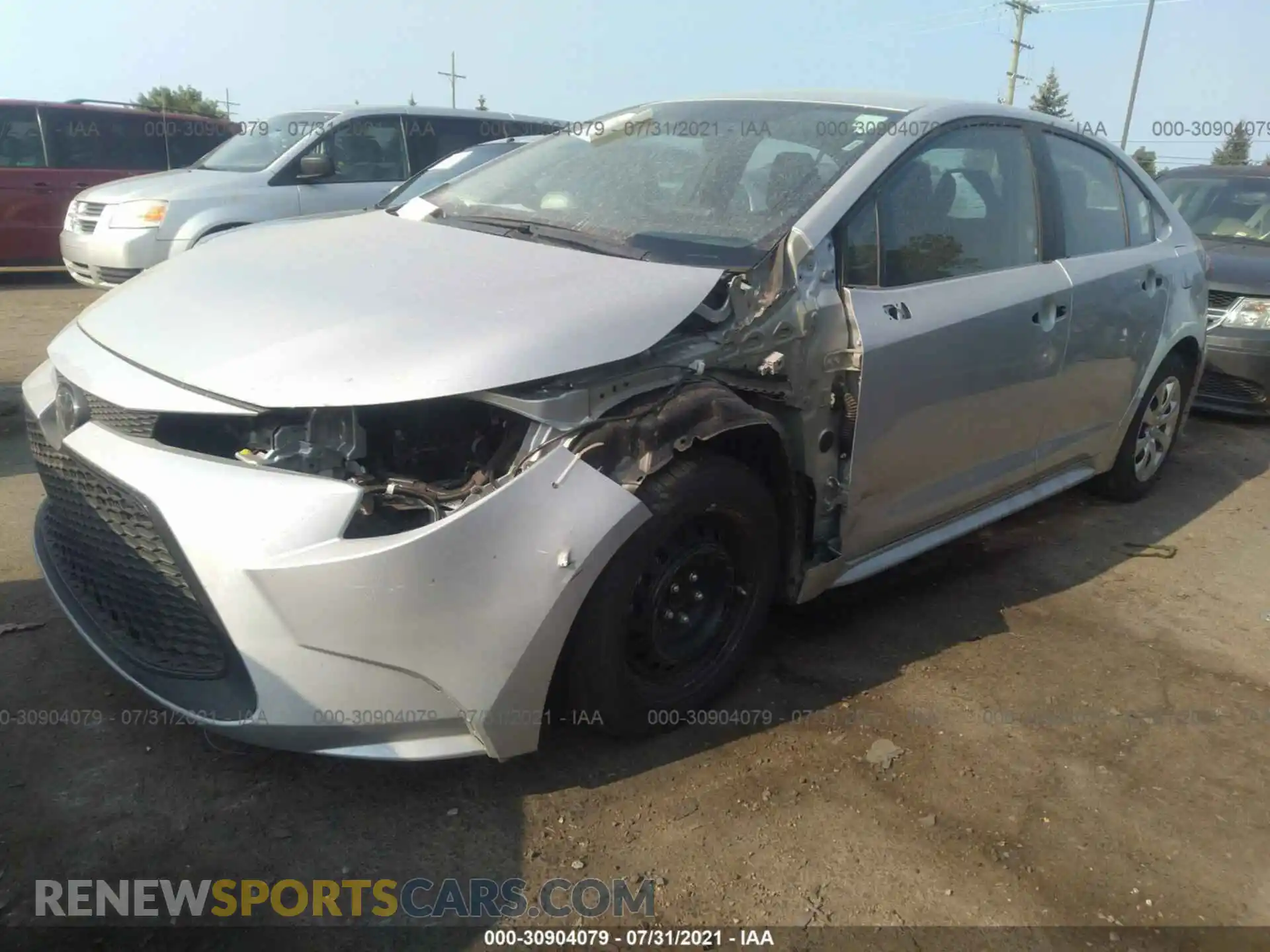 2 fotografías del automóvil dañado 5YFEPMAE1MP204854 TOYOTA COROLLA 2021