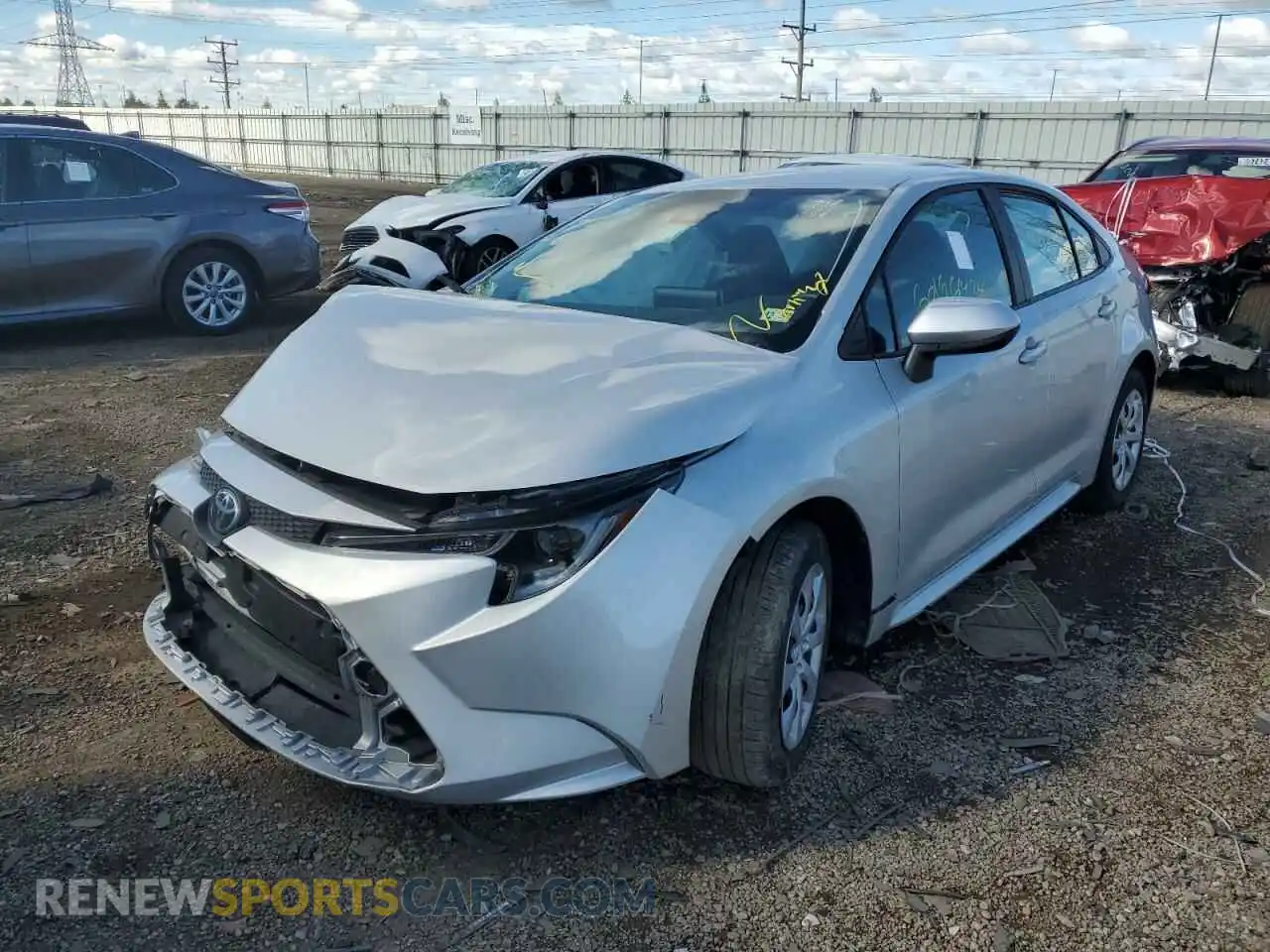 2 fotografías del automóvil dañado 5YFEPMAEXMP229901 TOYOTA COROLLA 2021