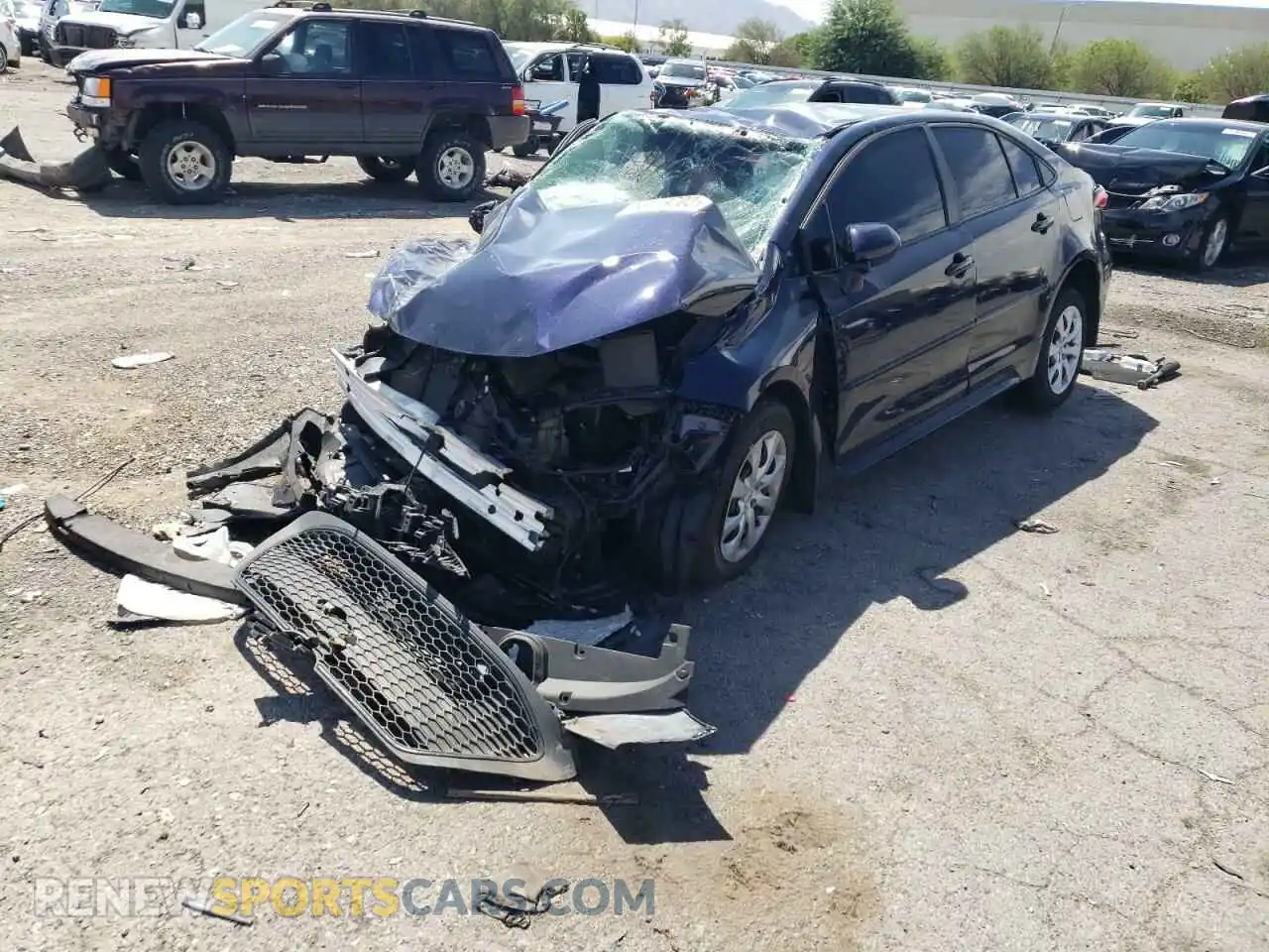 2 fotografías del automóvil dañado 5YFEPMAEXMP264907 TOYOTA COROLLA 2021