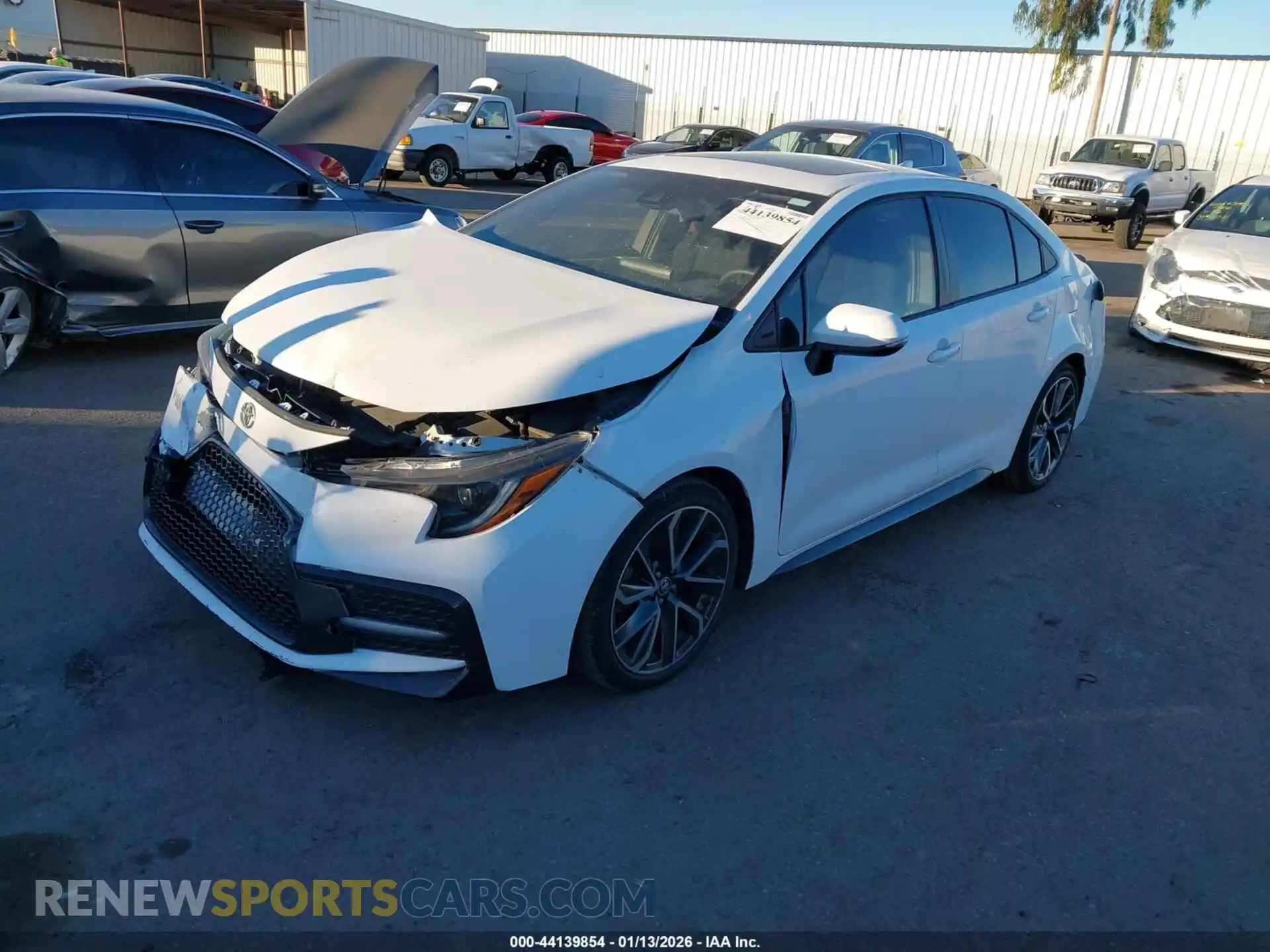 2 fotografías del automóvil dañado 5YFP4MCE3MP073294 TOYOTA COROLLA 2021