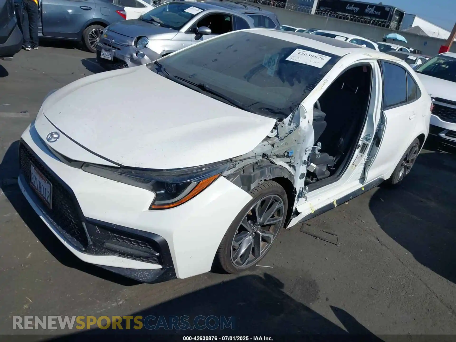 2 fotografías del automóvil dañado JTDP4MCE9NJ081115 TOYOTA COROLLA 2022