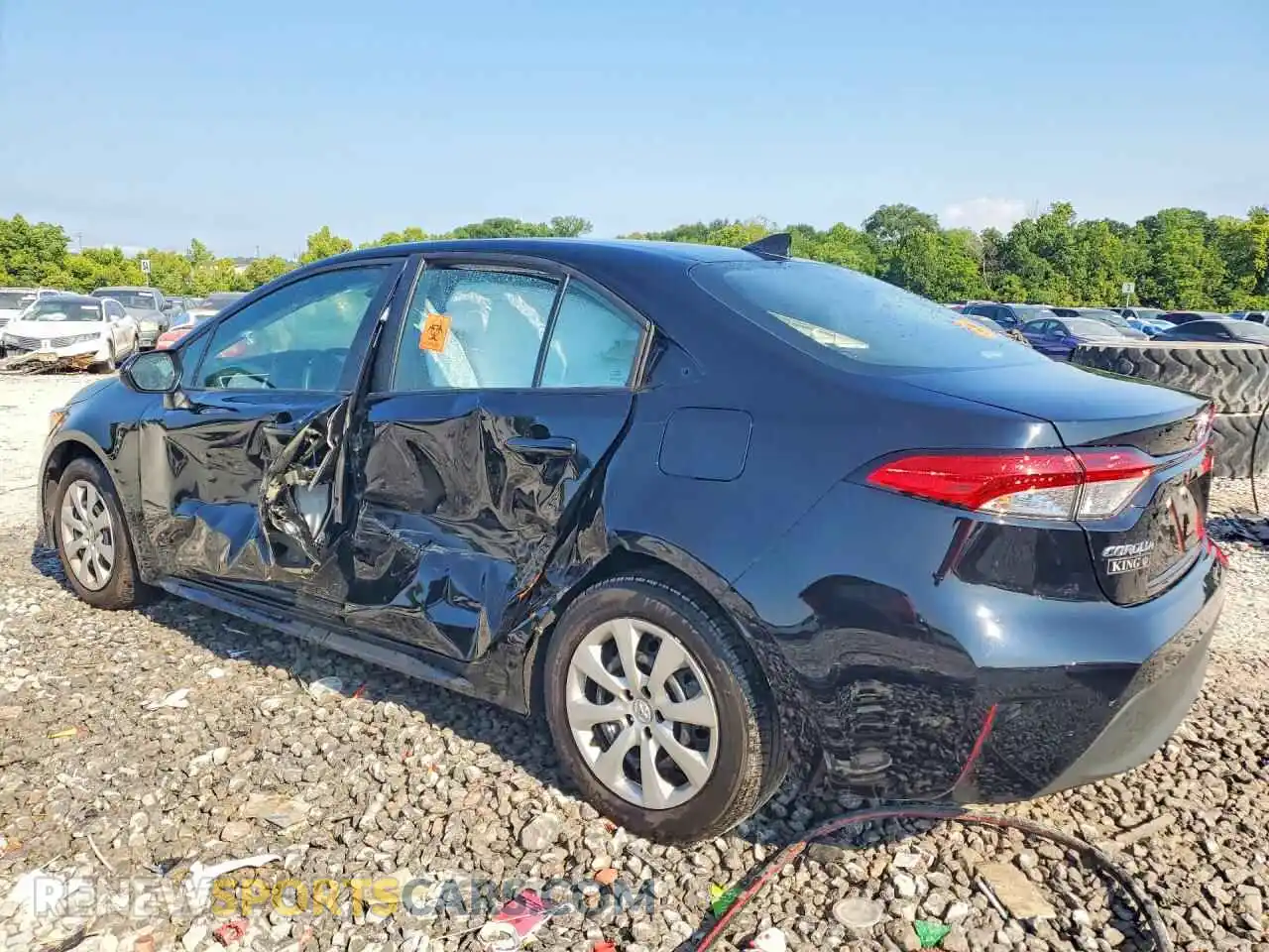 2 fotografías del automóvil dañado 5YFB4MDEXTP375740 TOYOTA COROLLA 2026