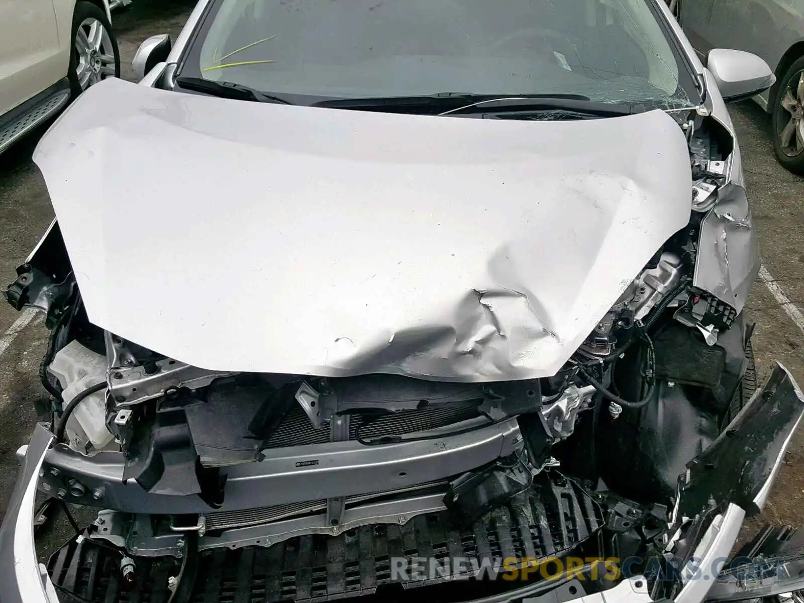 7 Photograph of a damaged car JTDKDTB33K1621574 TOYOTA PRIUS 2019