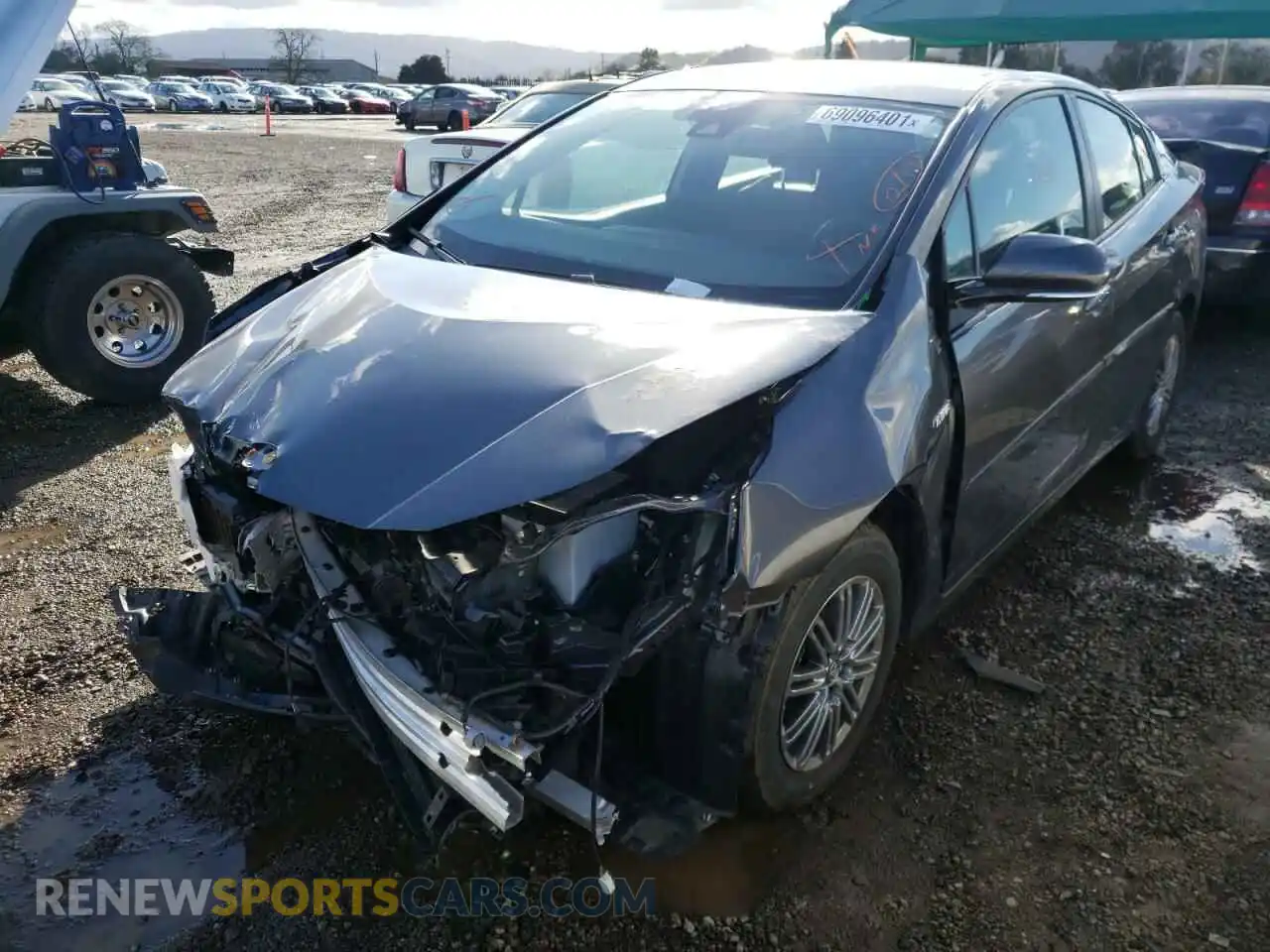 2 Photograph of a damaged car JTDL9RFU6K3000975 TOYOTA PRIUS 2019