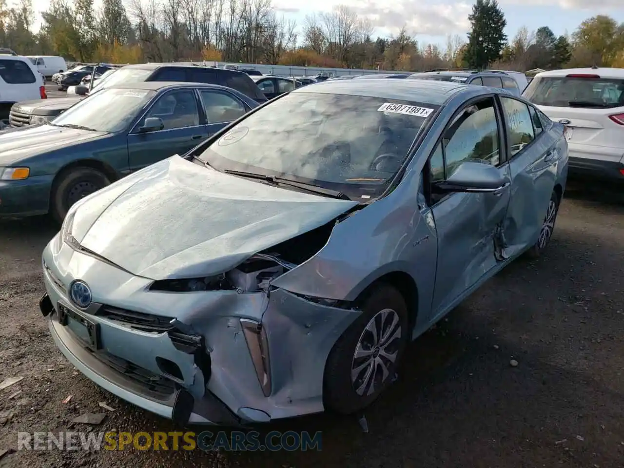 2 fotografías del automóvil dañado JTDL9RFU6L3013291 TOYOTA PRIUS 2020