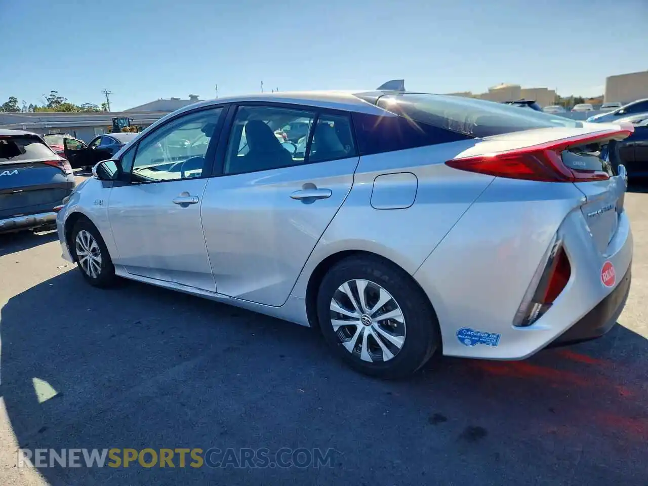 2 fotografías del automóvil dañado JTDKAMFP2M3192172 TOYOTA PRIUS 2021