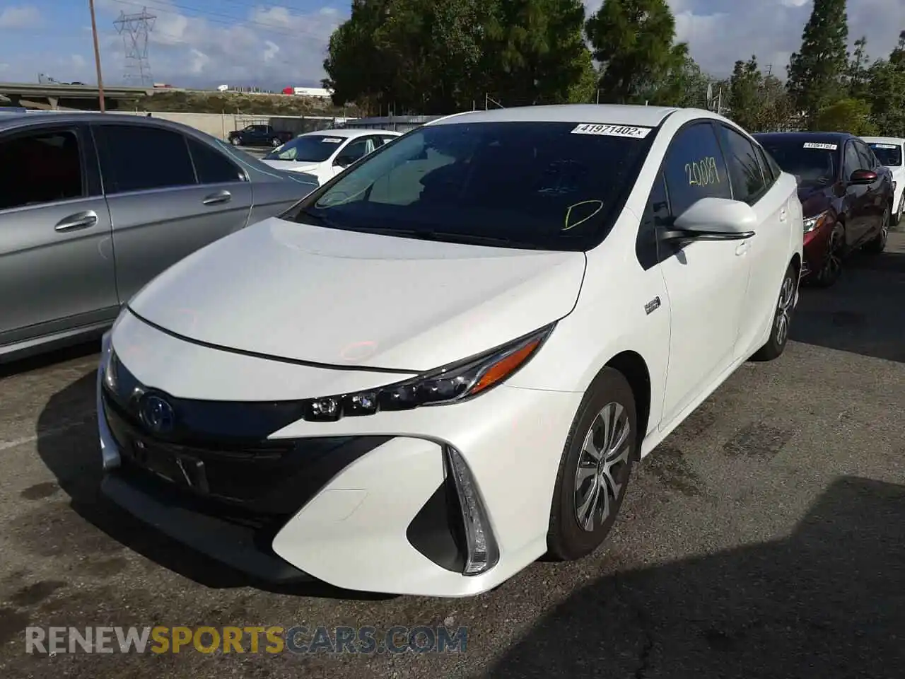 2 Photograph of a damaged car JTDKAMFP6M3190781 TOYOTA PRIUS 2021