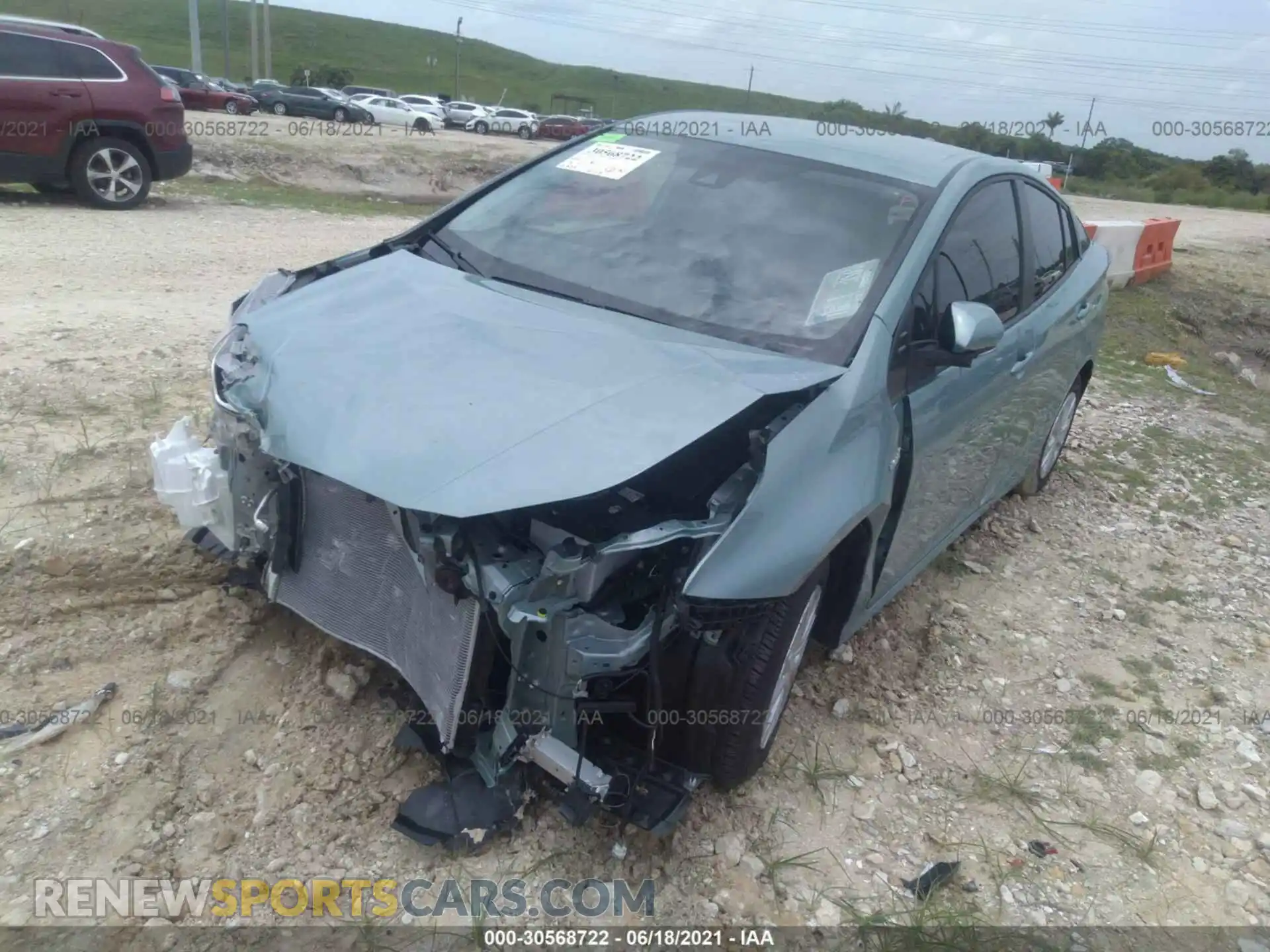 2 Photograph of a damaged car JTDKAMFU9M3138907 TOYOTA PRIUS 2021