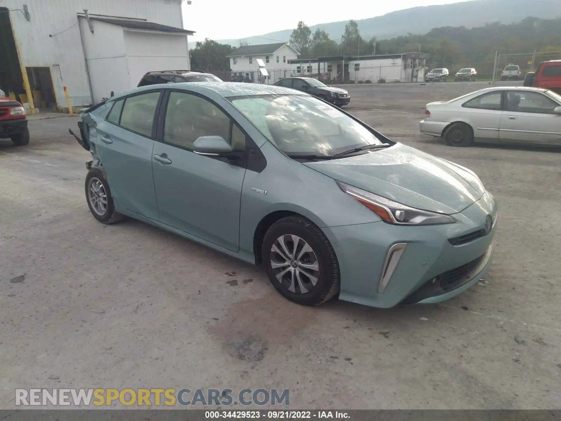 1 Photograph of a damaged car JTDL9MFUXM3031233 TOYOTA PRIUS 2021