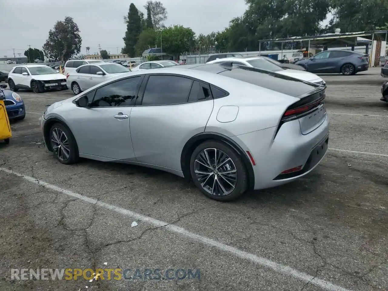 2 fotografías del automóvil dañado JTDACAAUXR3034252 TOYOTA PRIUS 2024