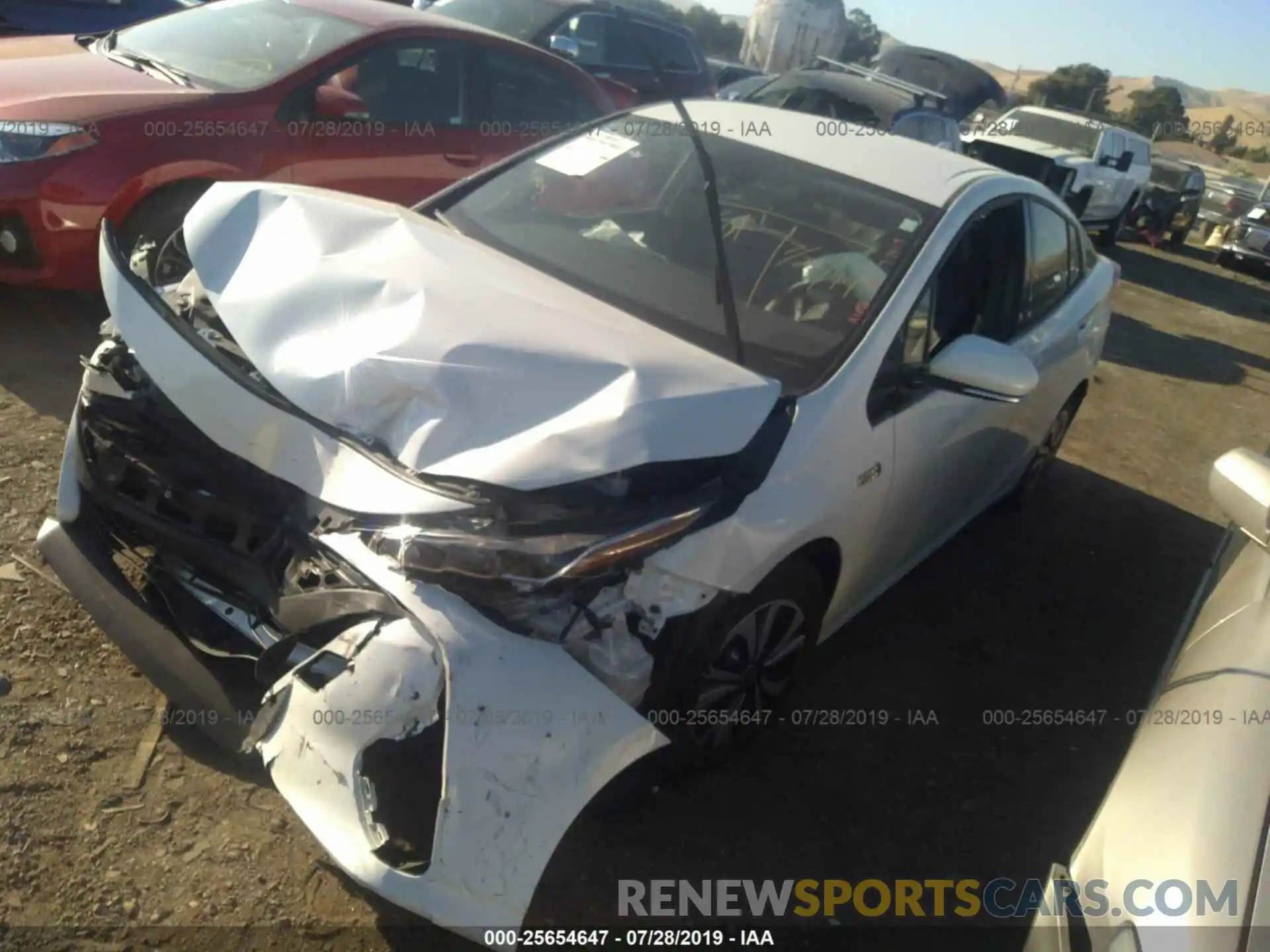 2 Photograph of a damaged car JTDKARFP6K3112396 TOYOTA PRIUS PRIME 2019