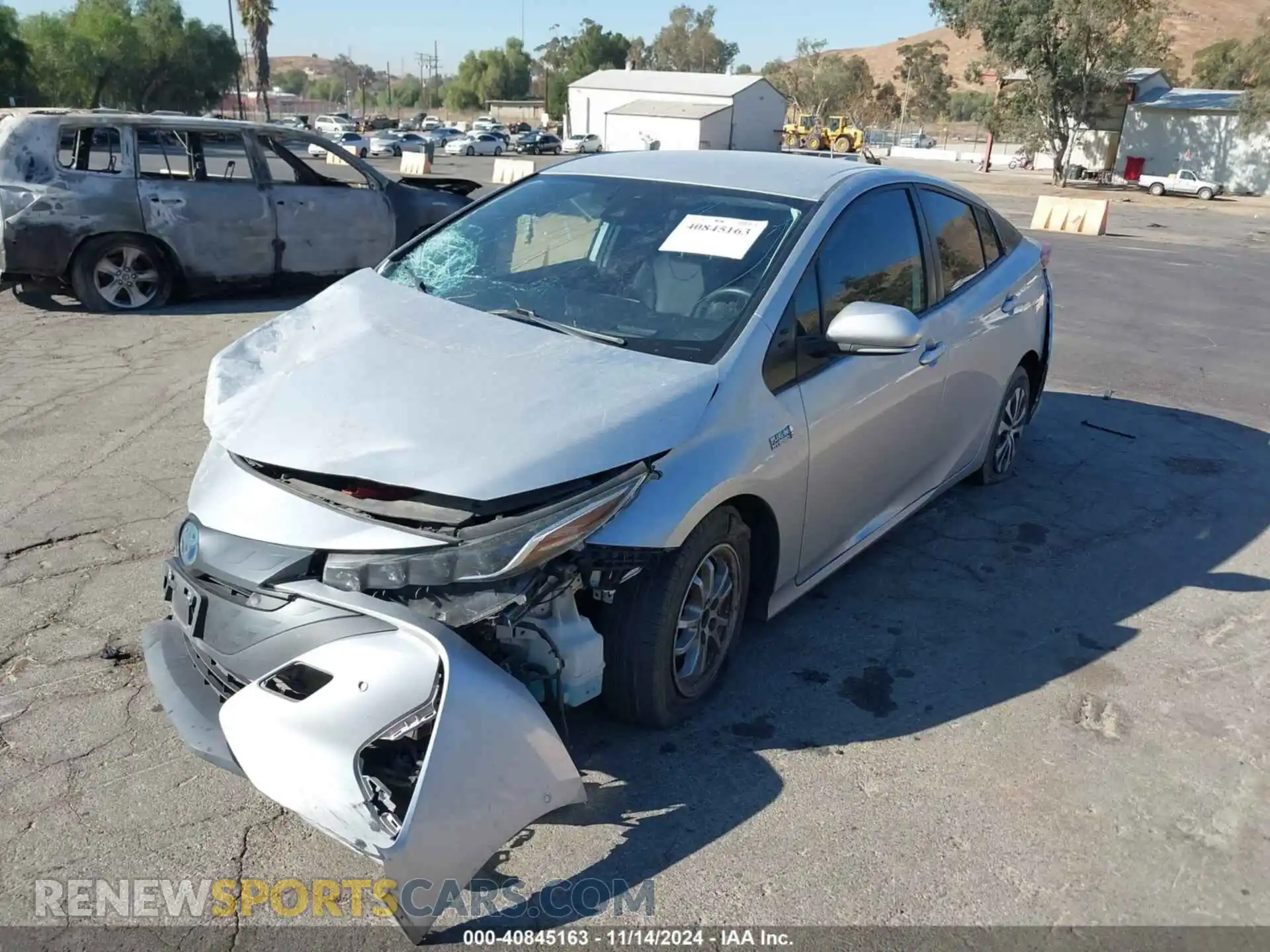 2 Photograph of a damaged car JTDKAMFPXM3180383 TOYOTA PRIUS PRIME 2021