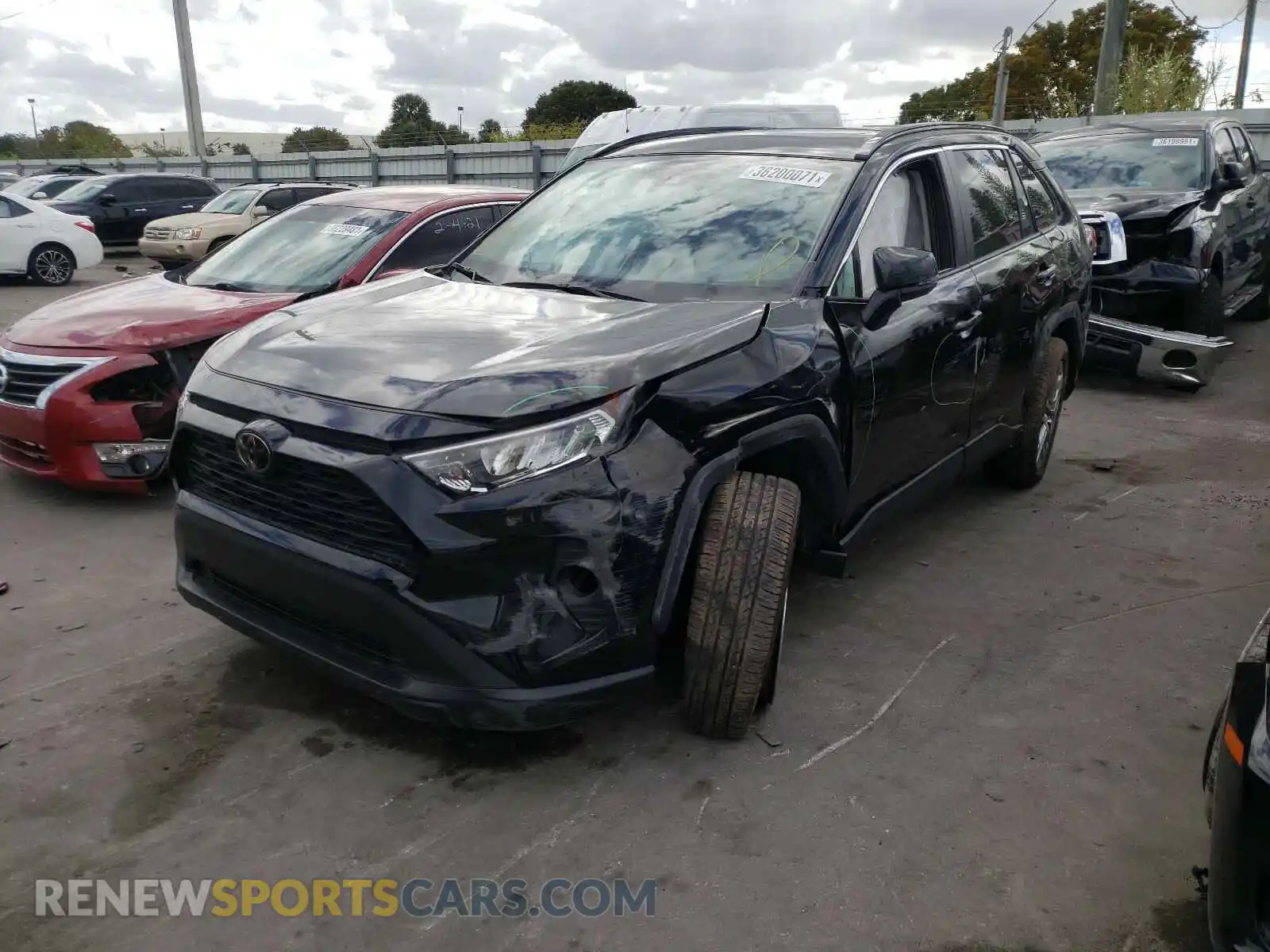 2 Photograph of a damaged car 2T3C1RFV0KW049893 TOYOTA RAV4 2019
