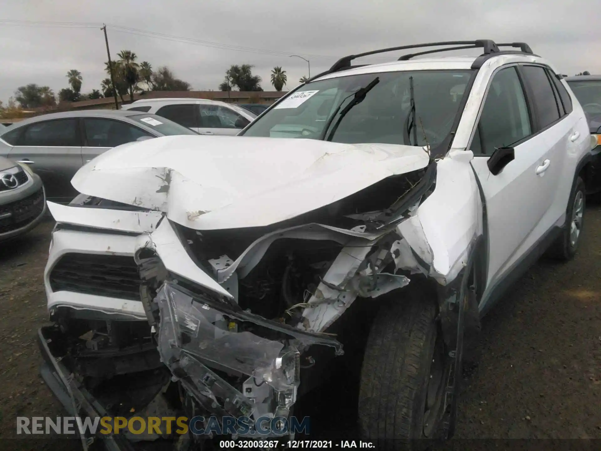 2 Photograph of a damaged car 2T3K1RFV0KW012869 TOYOTA RAV4 2019