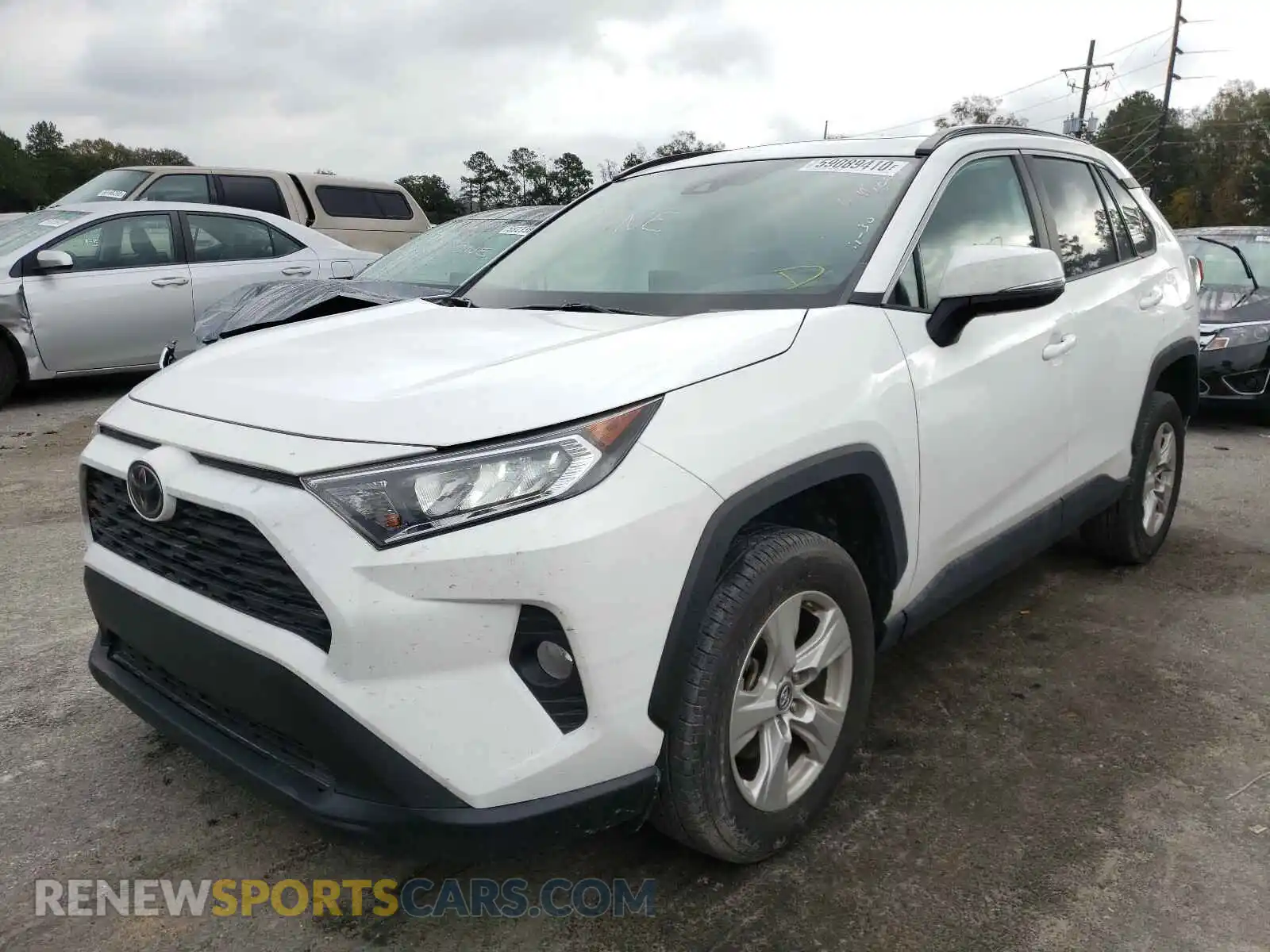 2 Photograph of a damaged car 2T3W1RFV4KC031007 TOYOTA RAV4 2019