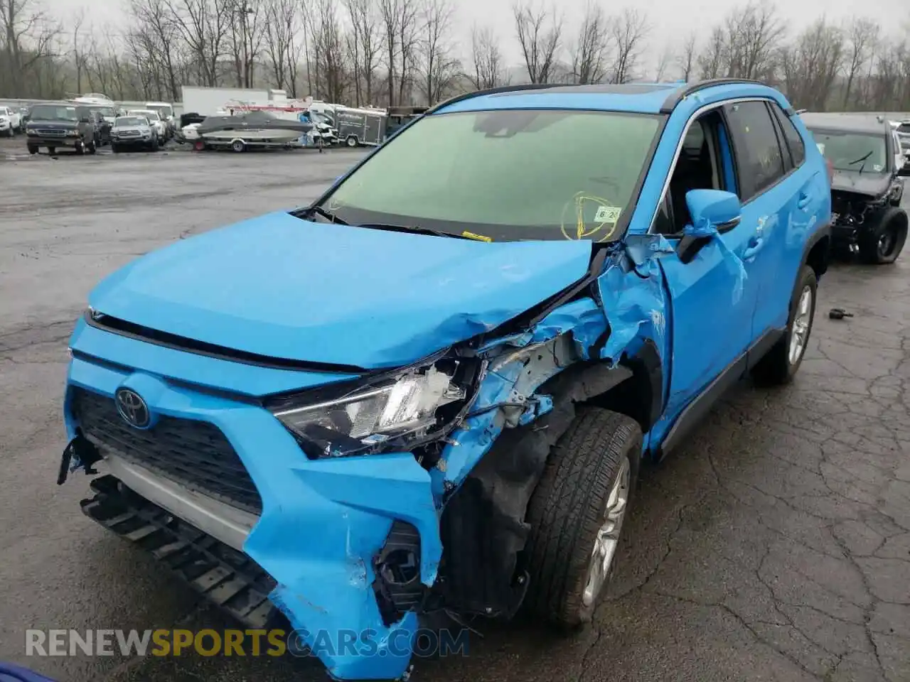 2 Photograph of a damaged car JTMP1RFV0KD009733 TOYOTA RAV4 2019