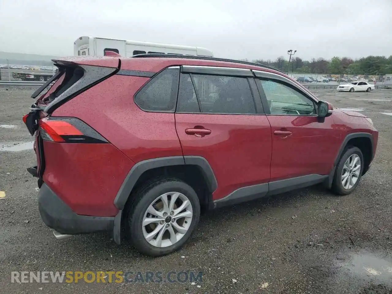 3 Photograph of a damaged car JTMP1RFV0KD021963 TOYOTA RAV4 2019