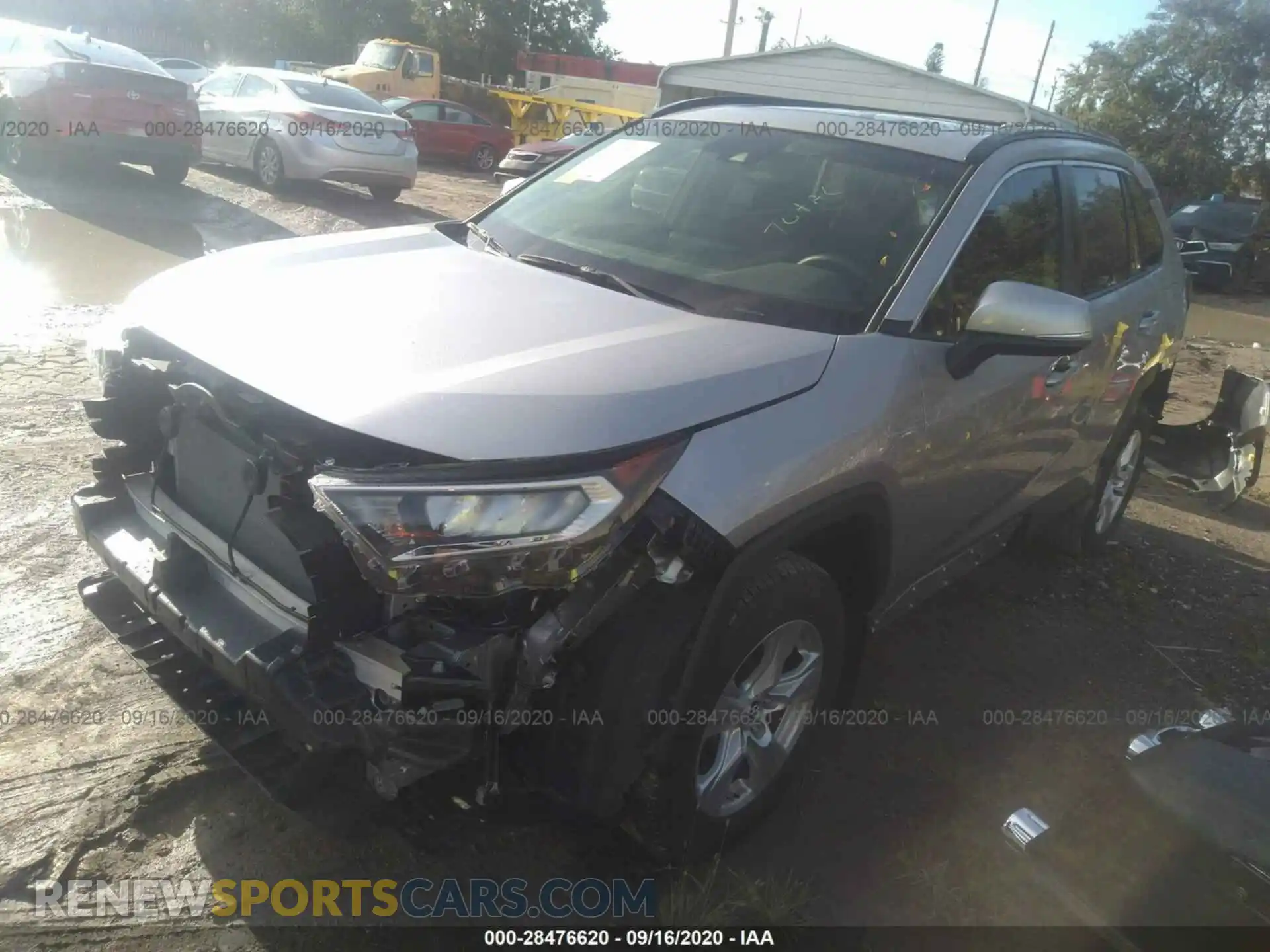 2 Photograph of a damaged car JTMP1RFV0KD033014 TOYOTA RAV4 2019