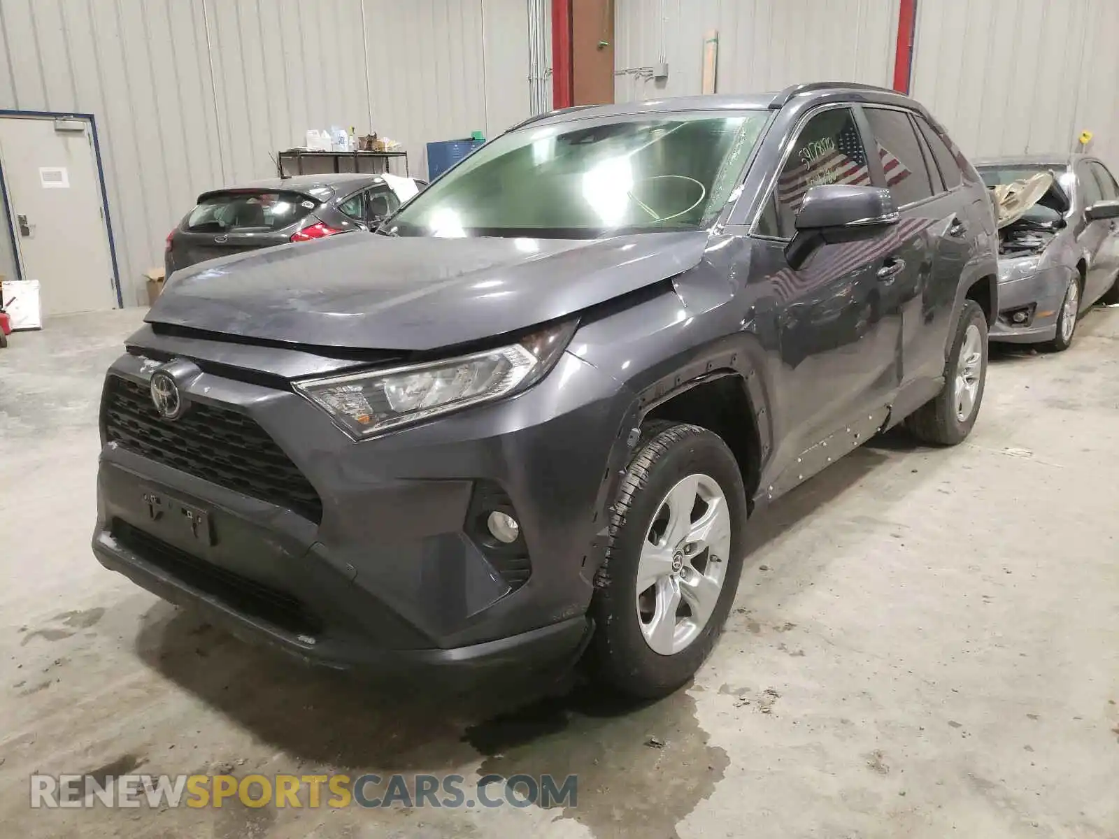2 Photograph of a damaged car JTMP1RFV1KD524269 TOYOTA RAV4 2019
