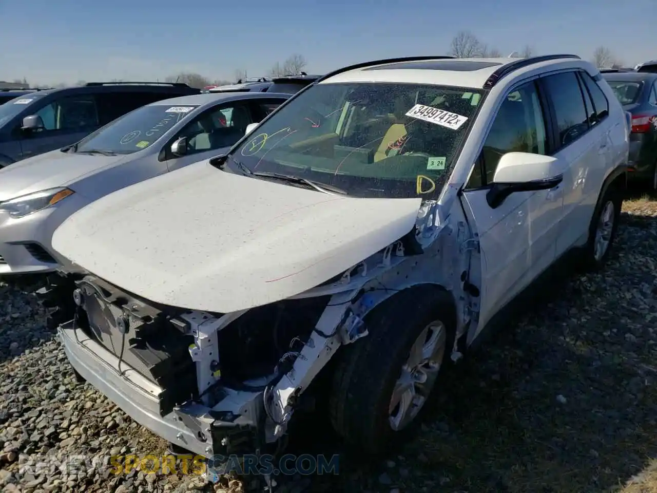 2 Photograph of a damaged car JTMP1RFV4KD013428 TOYOTA RAV4 2019