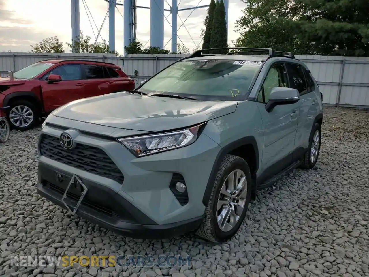 2 Photograph of a damaged car JTMA1RFV9MD073813 TOYOTA RAV4 2021