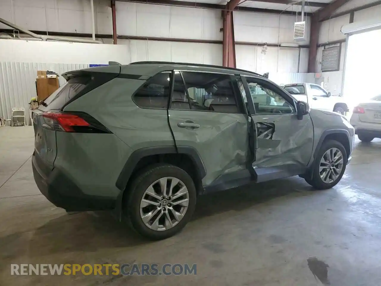 3 Photograph of a damaged car JTMC1RFV5MD072327 TOYOTA RAV4 2021