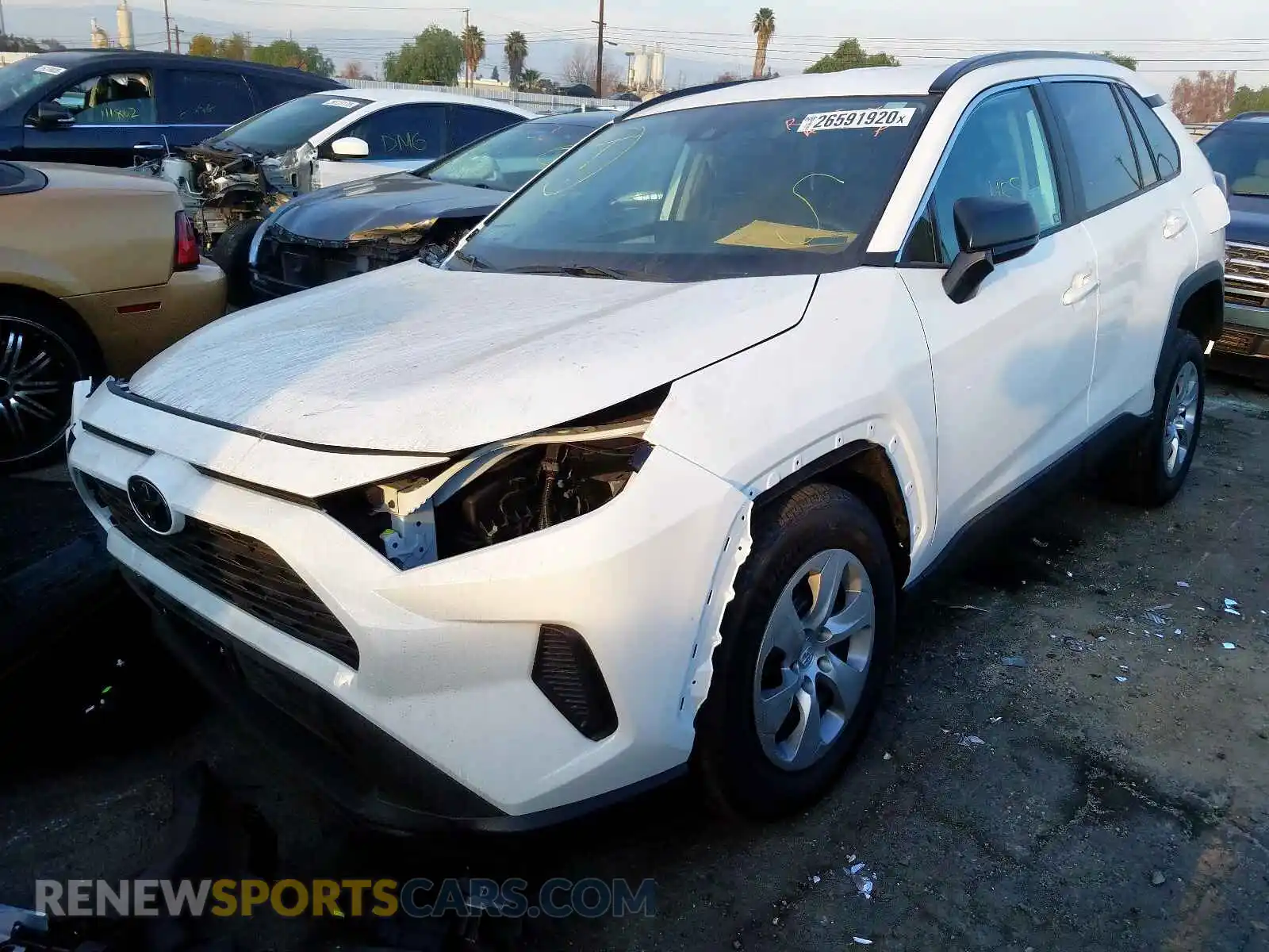 2 Photograph of a damaged car 2T3H1RFV2KC019057 TOYOTA RAV4 LE 2019