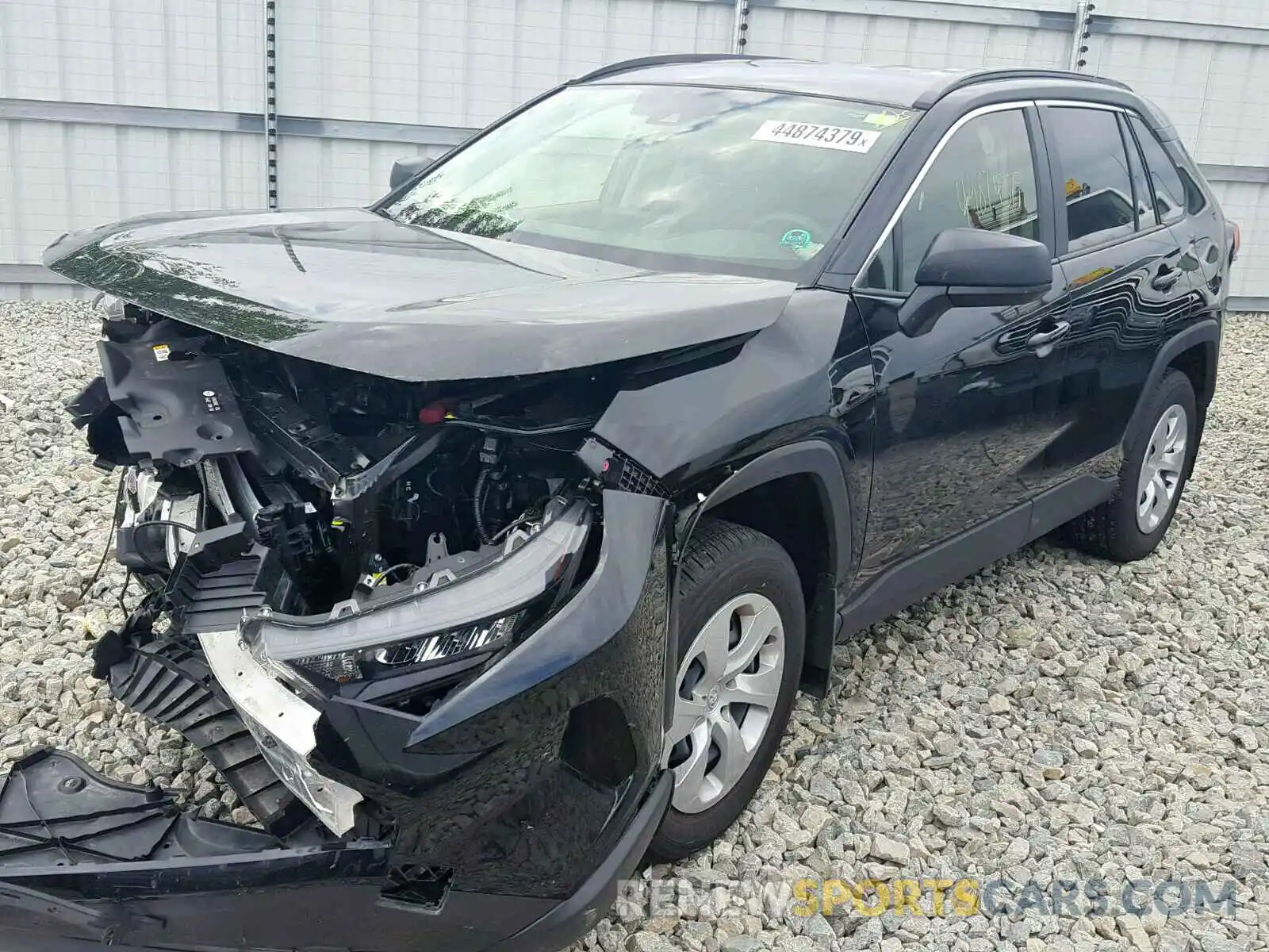 2 Photograph of a damaged car JTMF1RFV7KD502157 TOYOTA RAV4 LE 2019