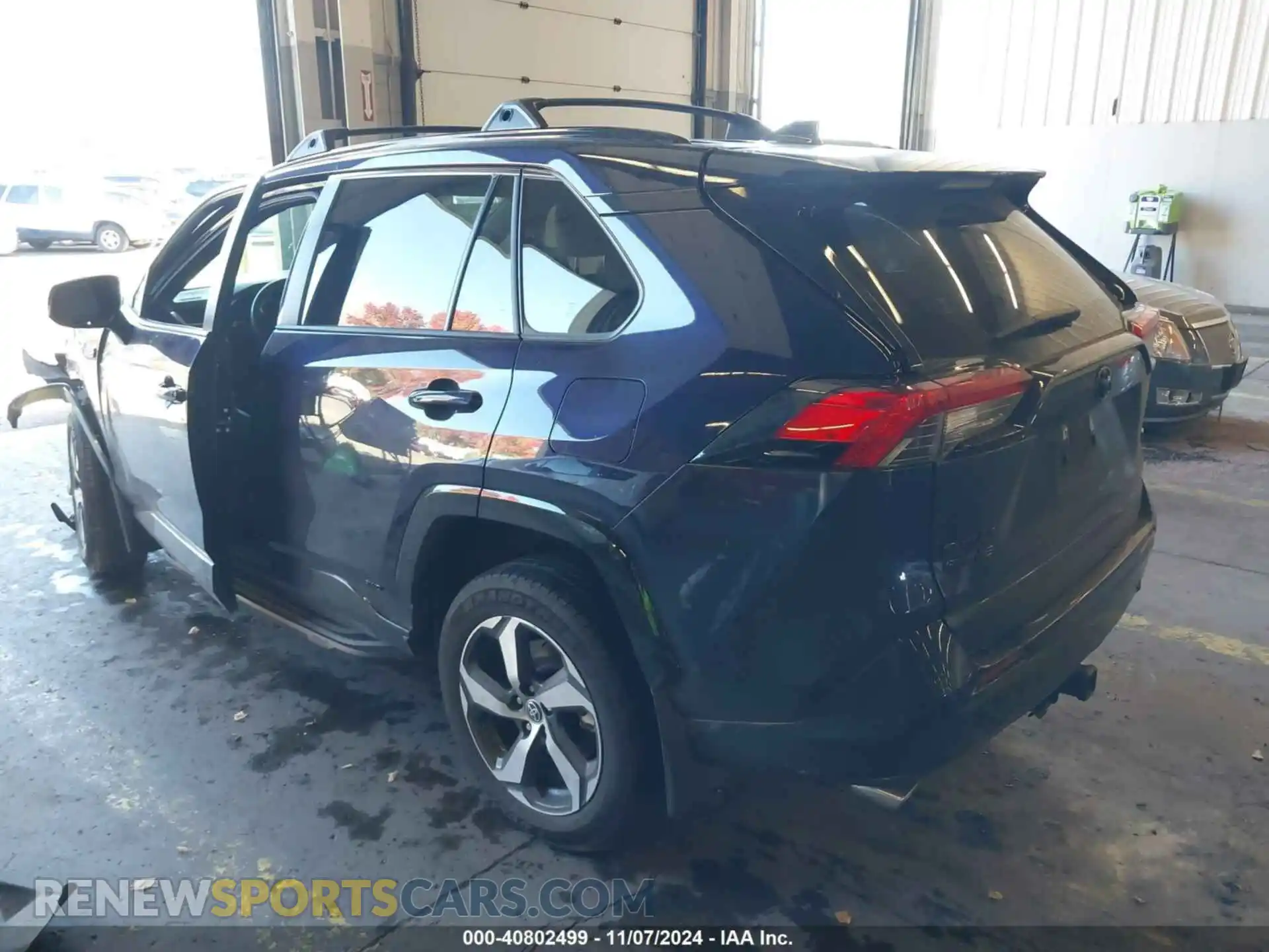 3 Photograph of a damaged car JTMAB3FV7PD116558 TOYOTA RAV4 PRIME 2023