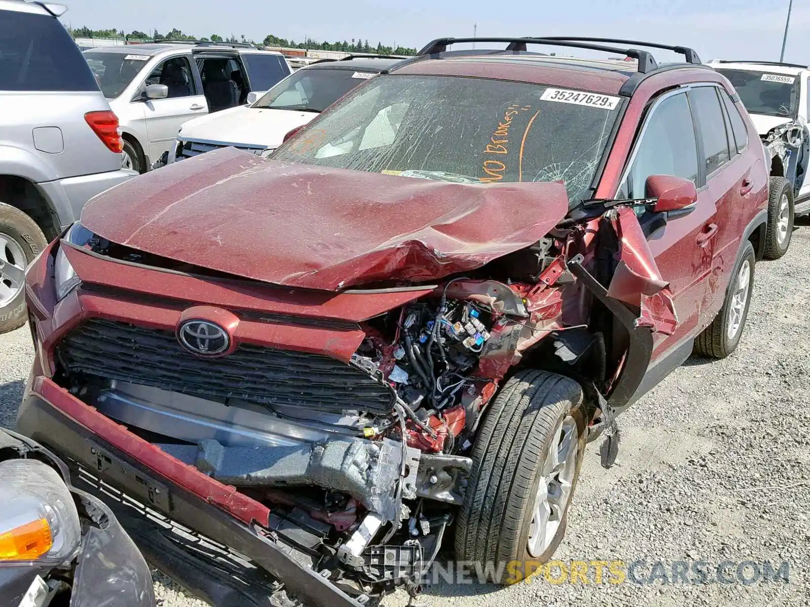 2 Photograph of a damaged car 2T3P1RFV0KW014126 TOYOTA RAV4 XLE 2019