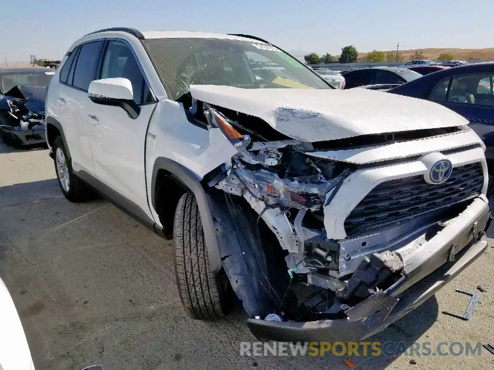 1 Photograph of a damaged car JTMRWRFV2KD015463 TOYOTA RAV4 XLE 2019