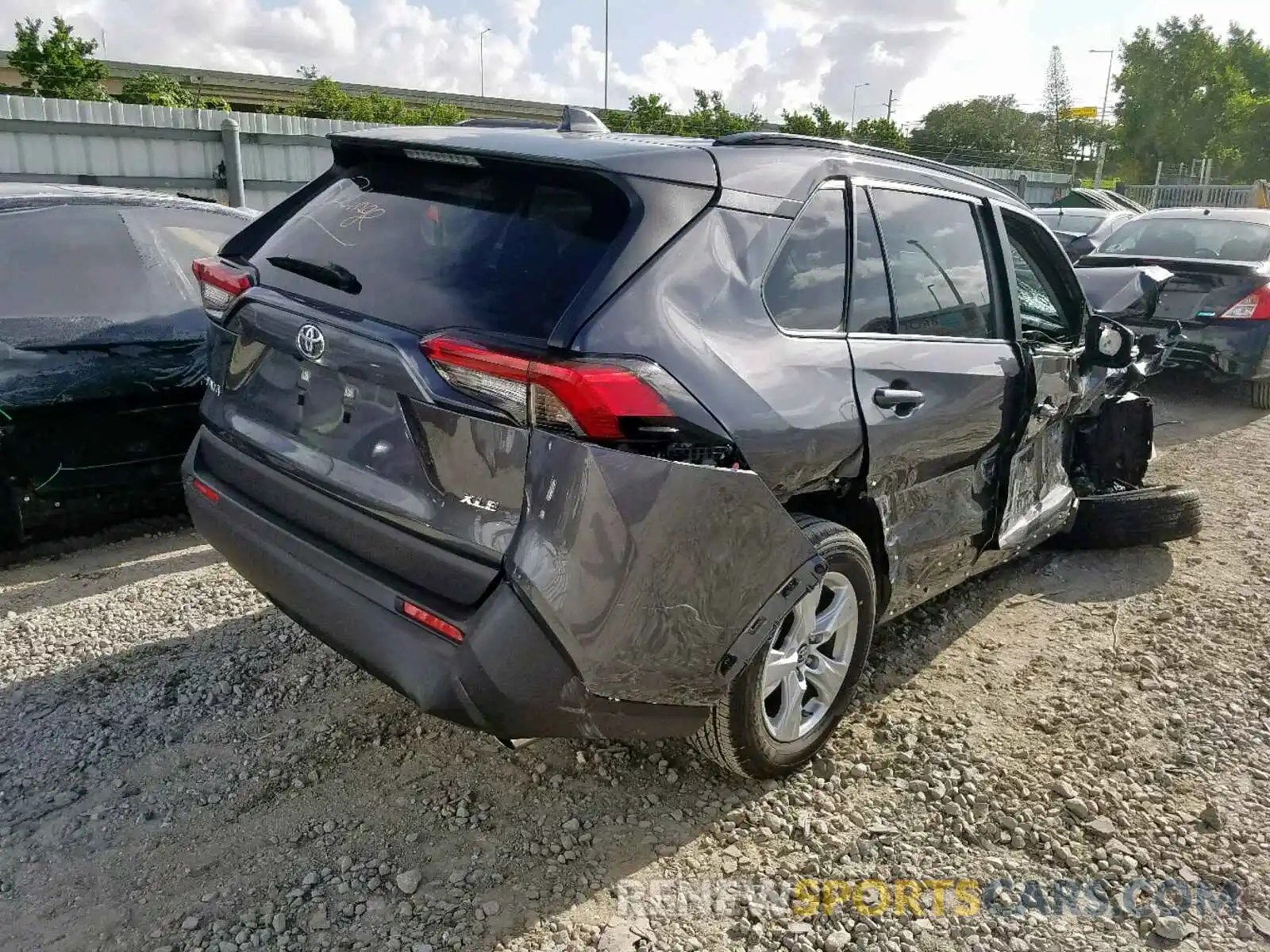 4 Photograph of a damaged car JTMW1RFV0KD502436 TOYOTA RAV4 XLE 2019