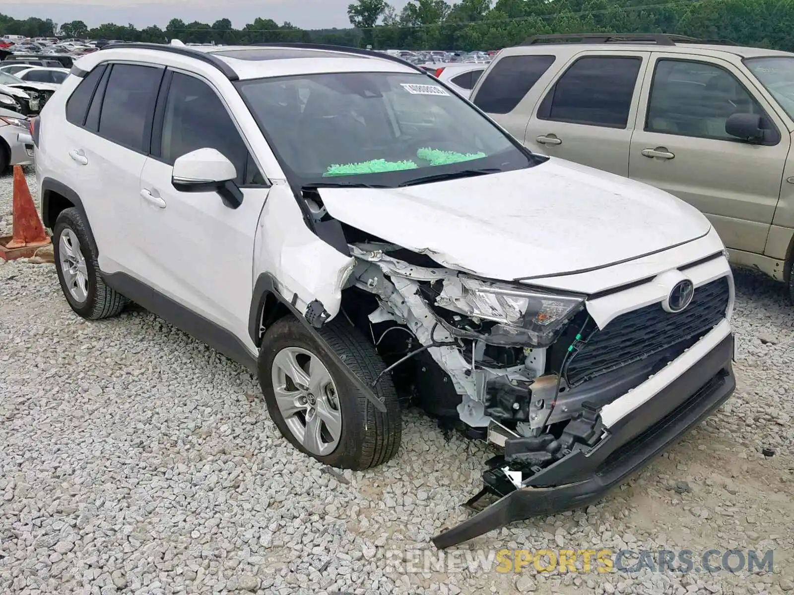 1 Photograph of a damaged car JTMW1RFV2KD009776 TOYOTA RAV4 XLE 2019