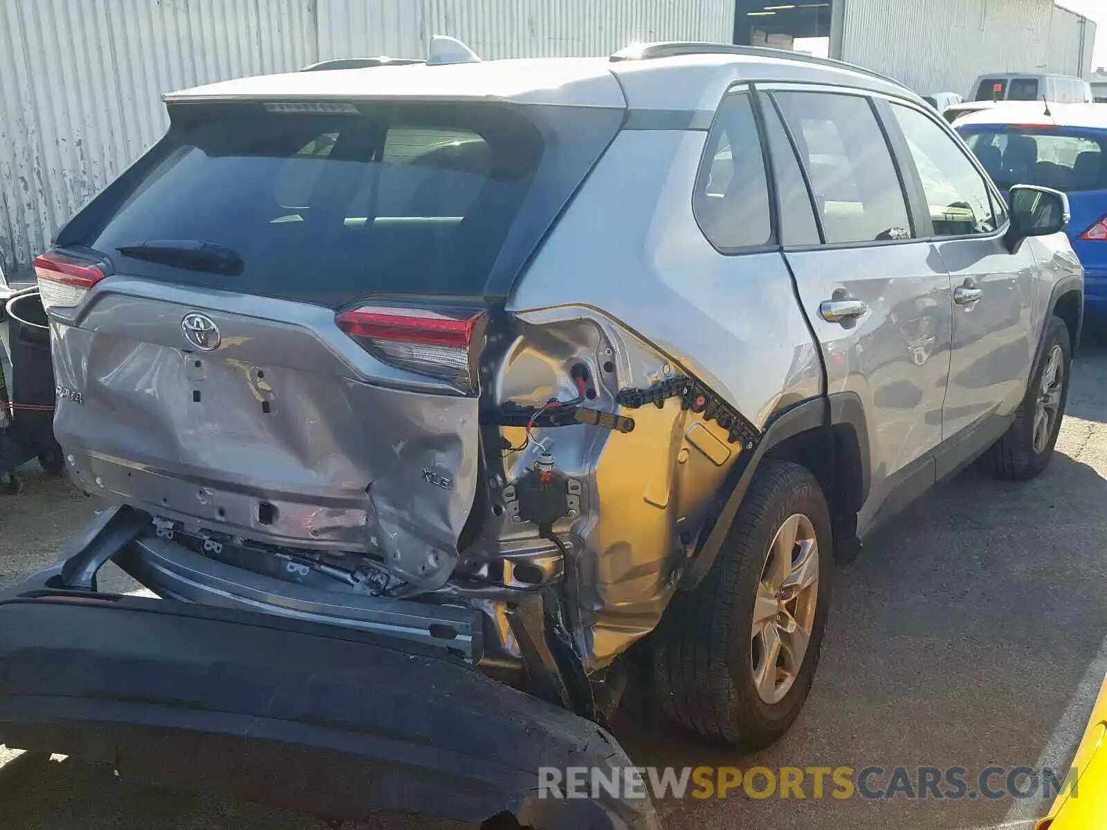 4 Photograph of a damaged car JTMW1RFV7KD013421 TOYOTA RAV4 XLE 2019