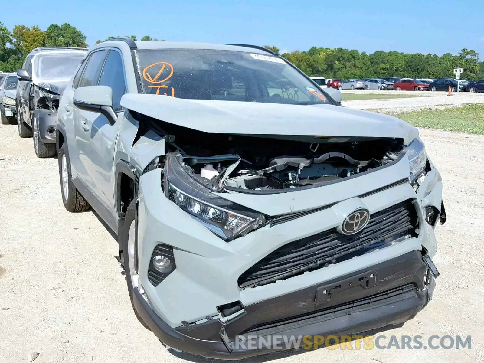 1 Photograph of a damaged car JTMW1RFV7KD024967 TOYOTA RAV4 XLE 2019