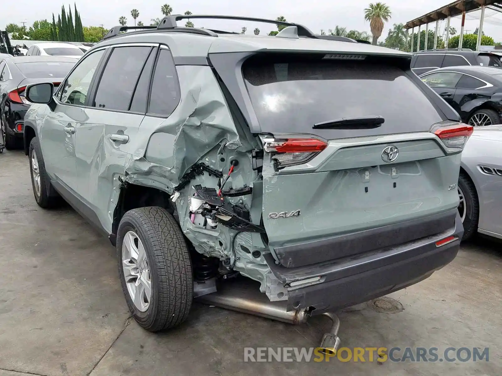 3 Photograph of a damaged car JTMW1RFV8KD506301 TOYOTA RAV4 XLE 2019
