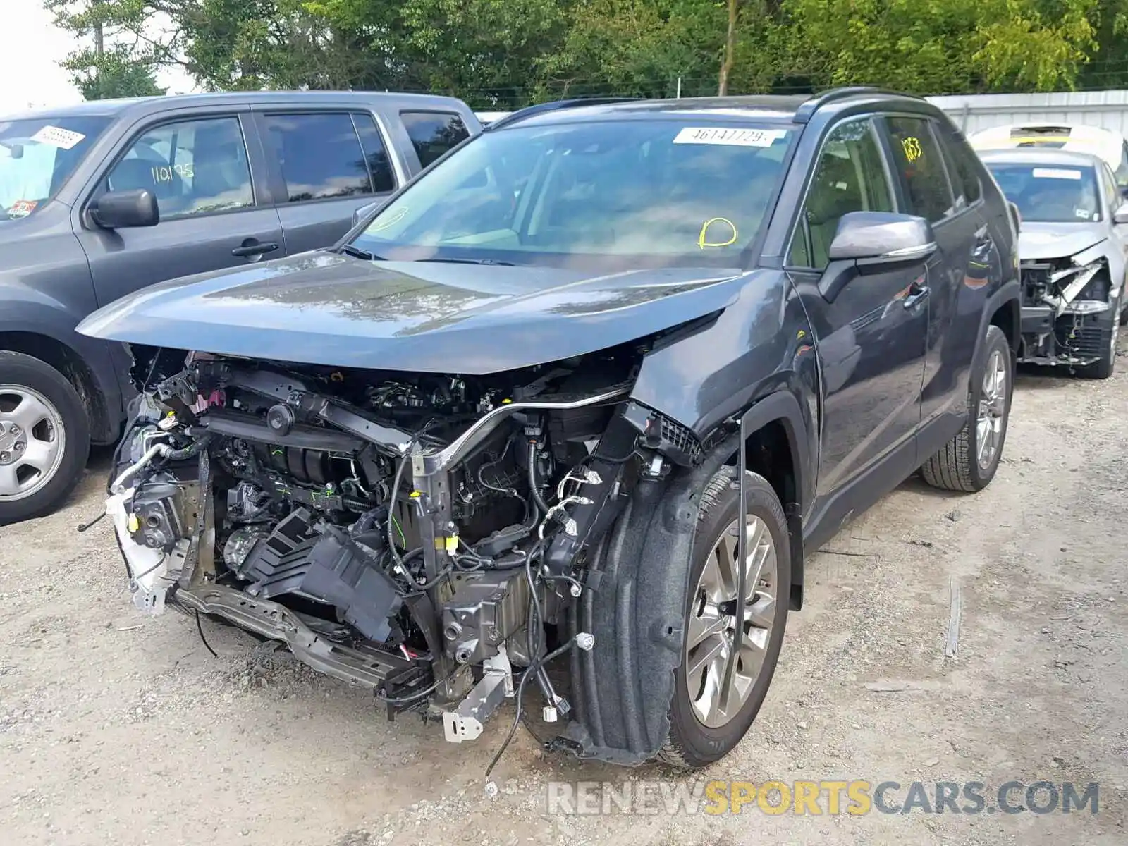 2 Photograph of a damaged car JTMA1RFV6KD517436 TOYOTA RAV4 XLE P 2019