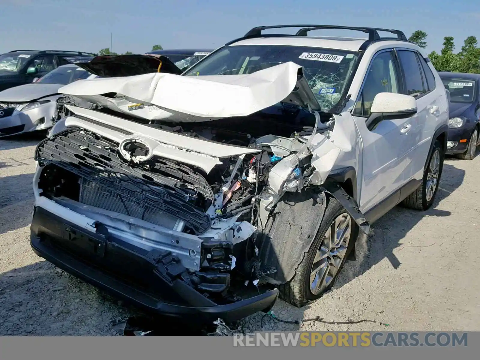 2 Photograph of a damaged car JTMC1RFV0KD014591 TOYOTA RAV4 XLE P 2019
