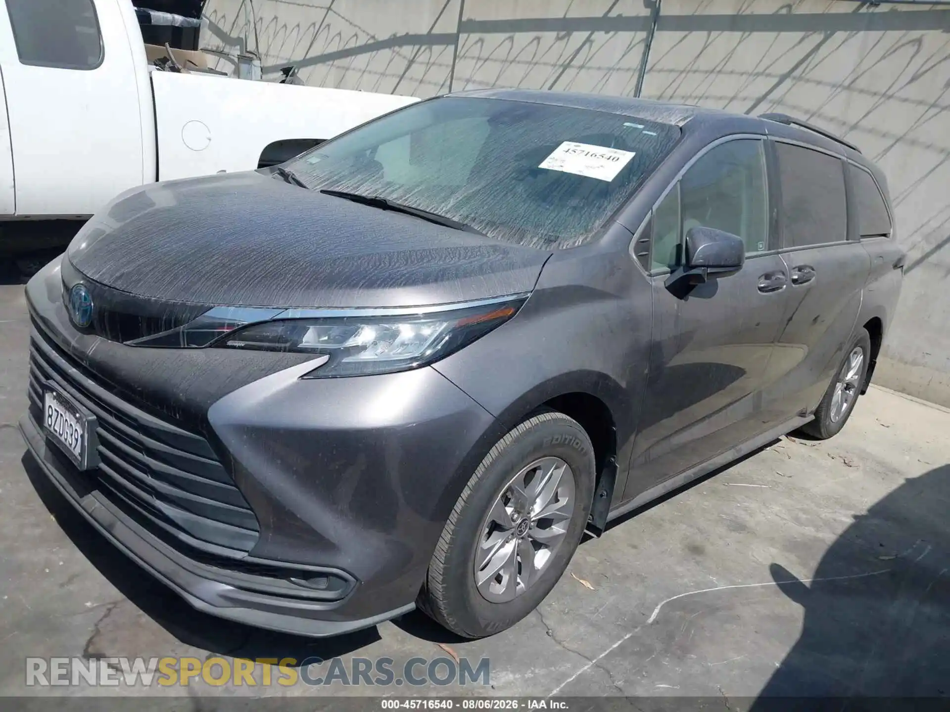 2 fotografías del automóvil dañado 5TDBRKEC2NS086882 TOYOTA SIENNA 2022