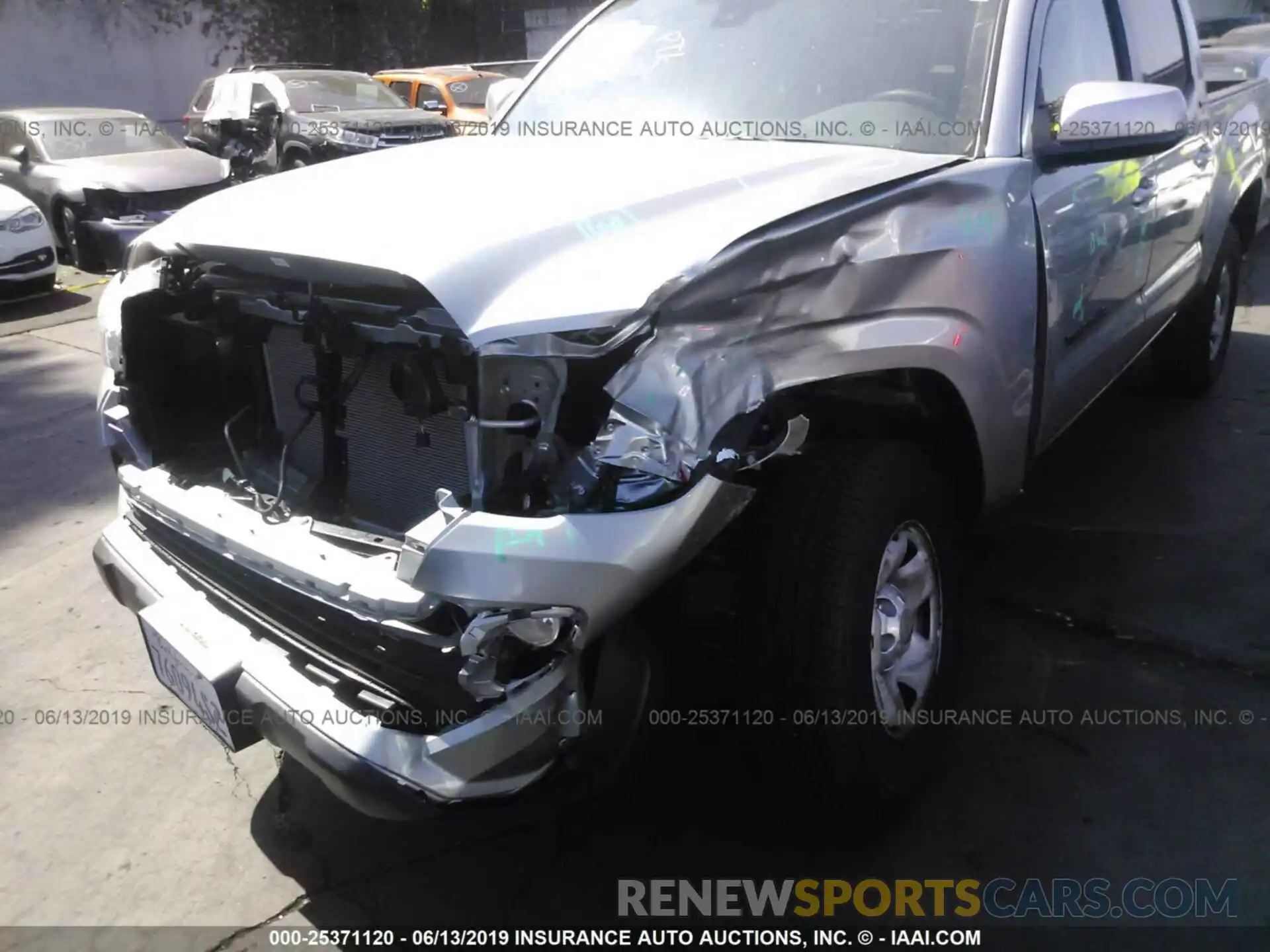 6 Photograph of a damaged car 5TFAX5GNXKX149573 TOYOTA TACOMA 2019