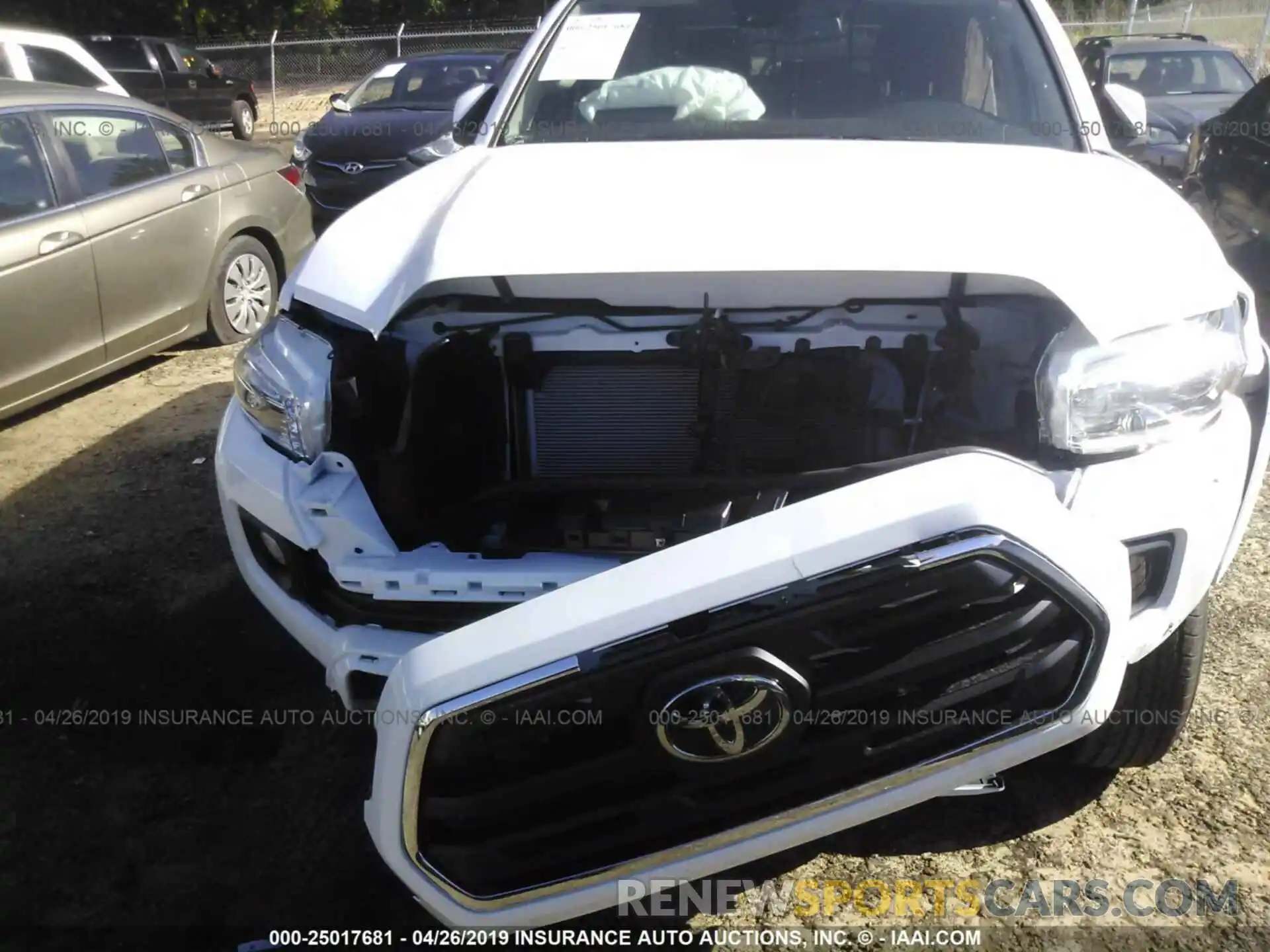 6 Photograph of a damaged car 5TFAZ5CN1KX074598 TOYOTA TACOMA 2019