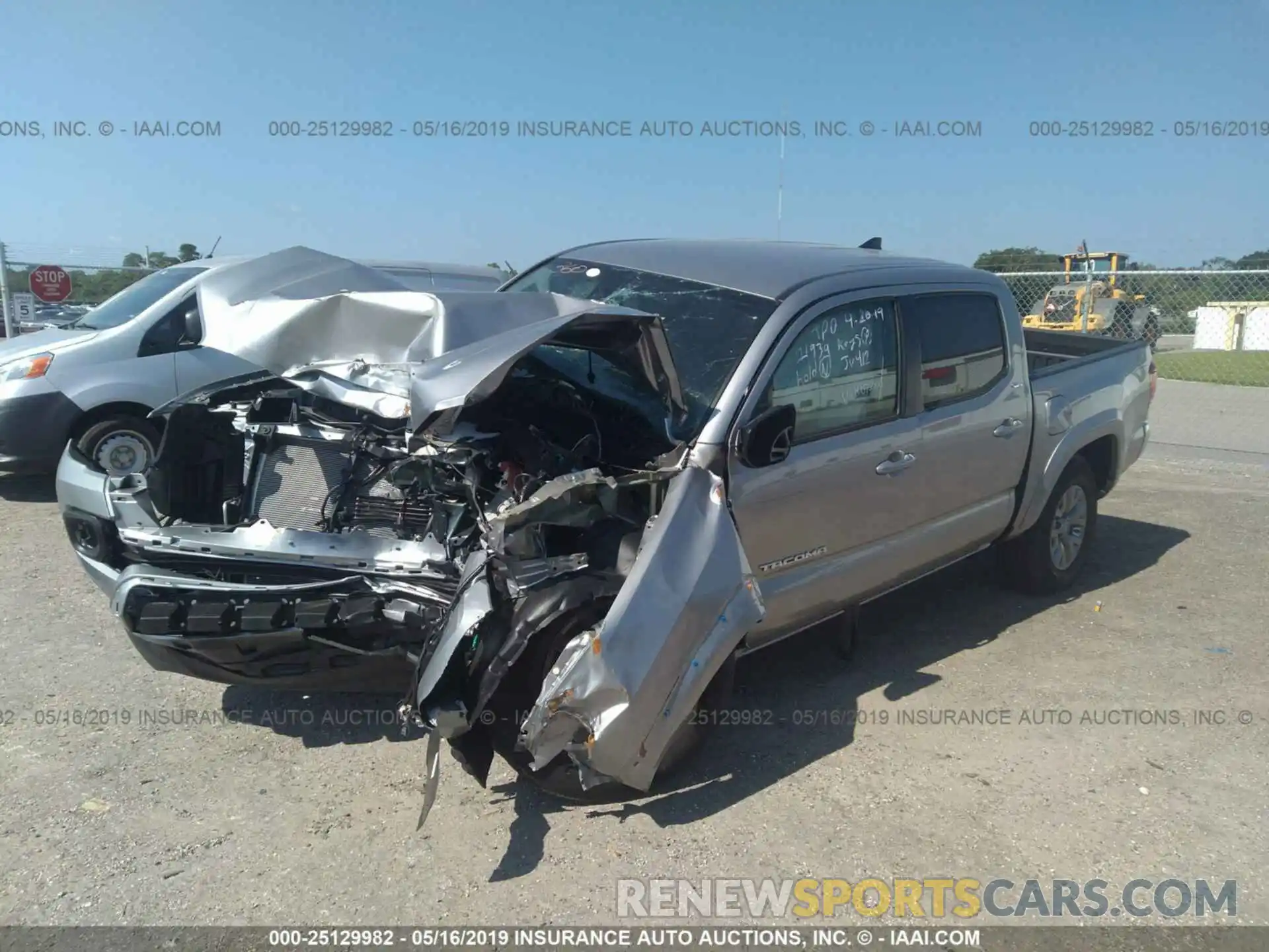 2 Photograph of a damaged car 5TFAZ5CN8KX075506 TOYOTA TACOMA 2019