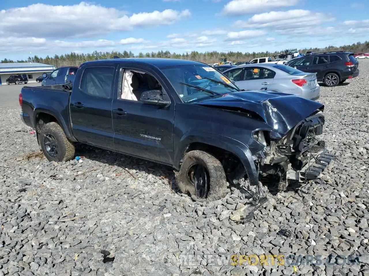 4 Photograph of a damaged car 5TFCZ5AN1KX208716 TOYOTA TACOMA 2019