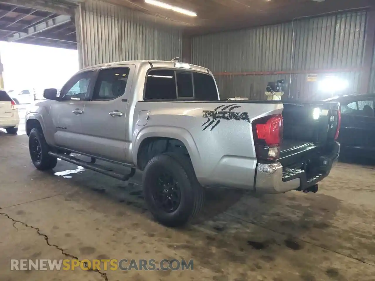 2 Photograph of a damaged car 3TYAX5GN3MT01231X TOYOTA TACOMA 2021