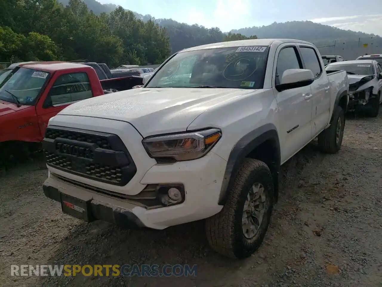 2 fotografías del automóvil dañado 3TYCZ5AN1NT056421 TOYOTA TACOMA 2022