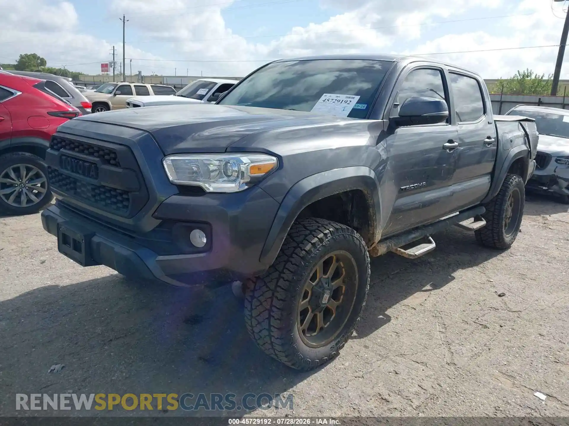 2 fotografías del automóvil dañado 3TYCZ5AN6NT071657 TOYOTA TACOMA 2022