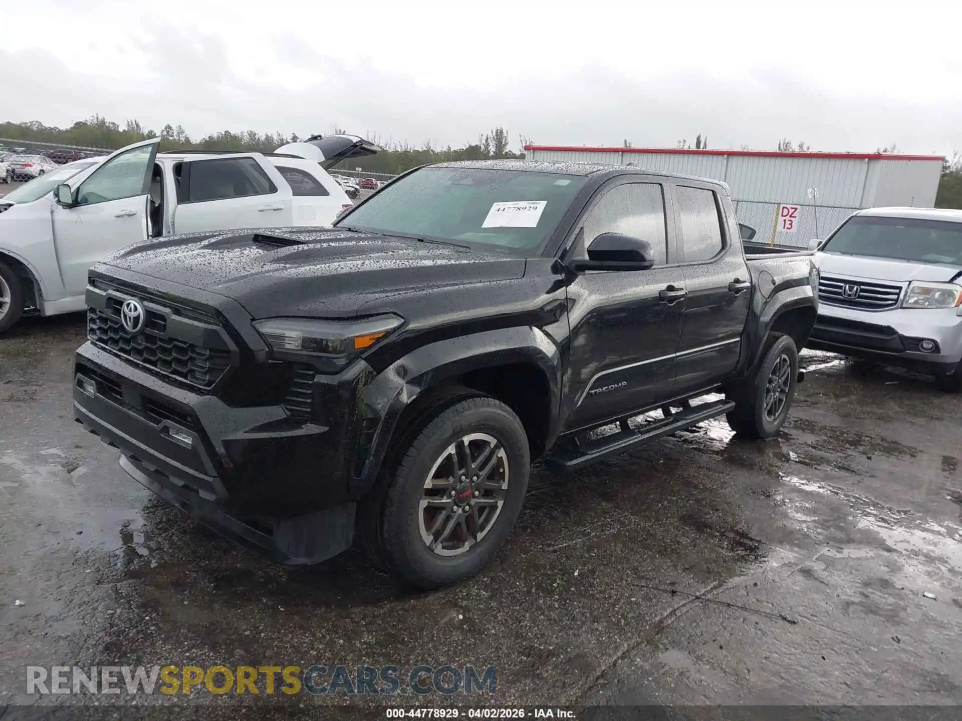 2 Photograph of a damaged car 3TMKB5FN9RM013035 TOYOTA TACOMA 2024