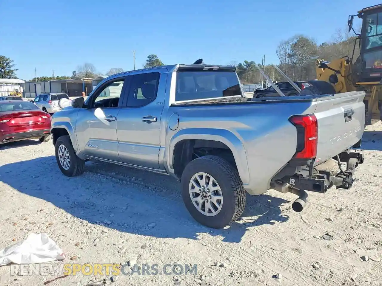 2 fotografías del automóvil dañado 3TMKB5FN9RM021135 TOYOTA TACOMA 2024